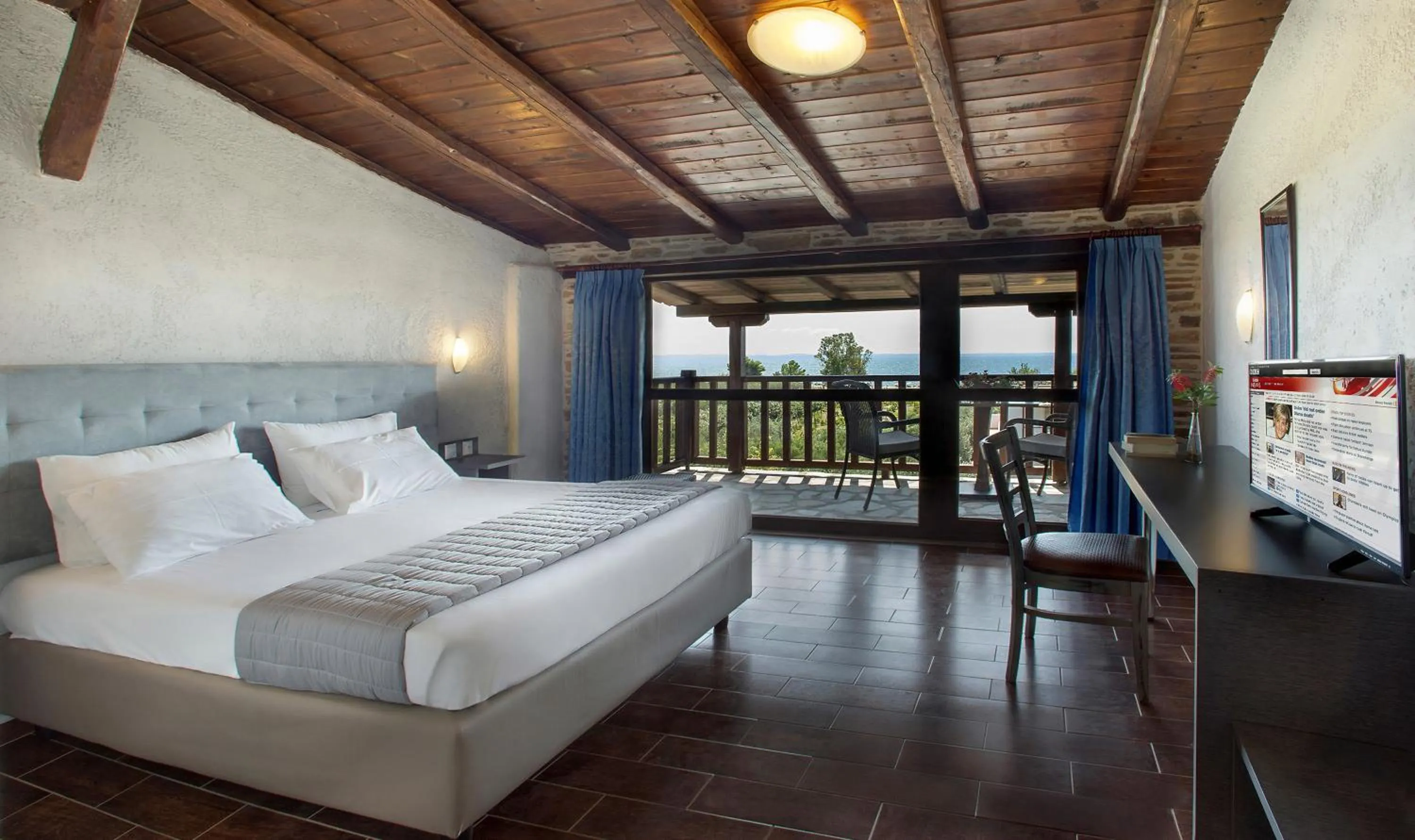 Photo of the whole room in Coral Blue Beach Hotel Gerakini