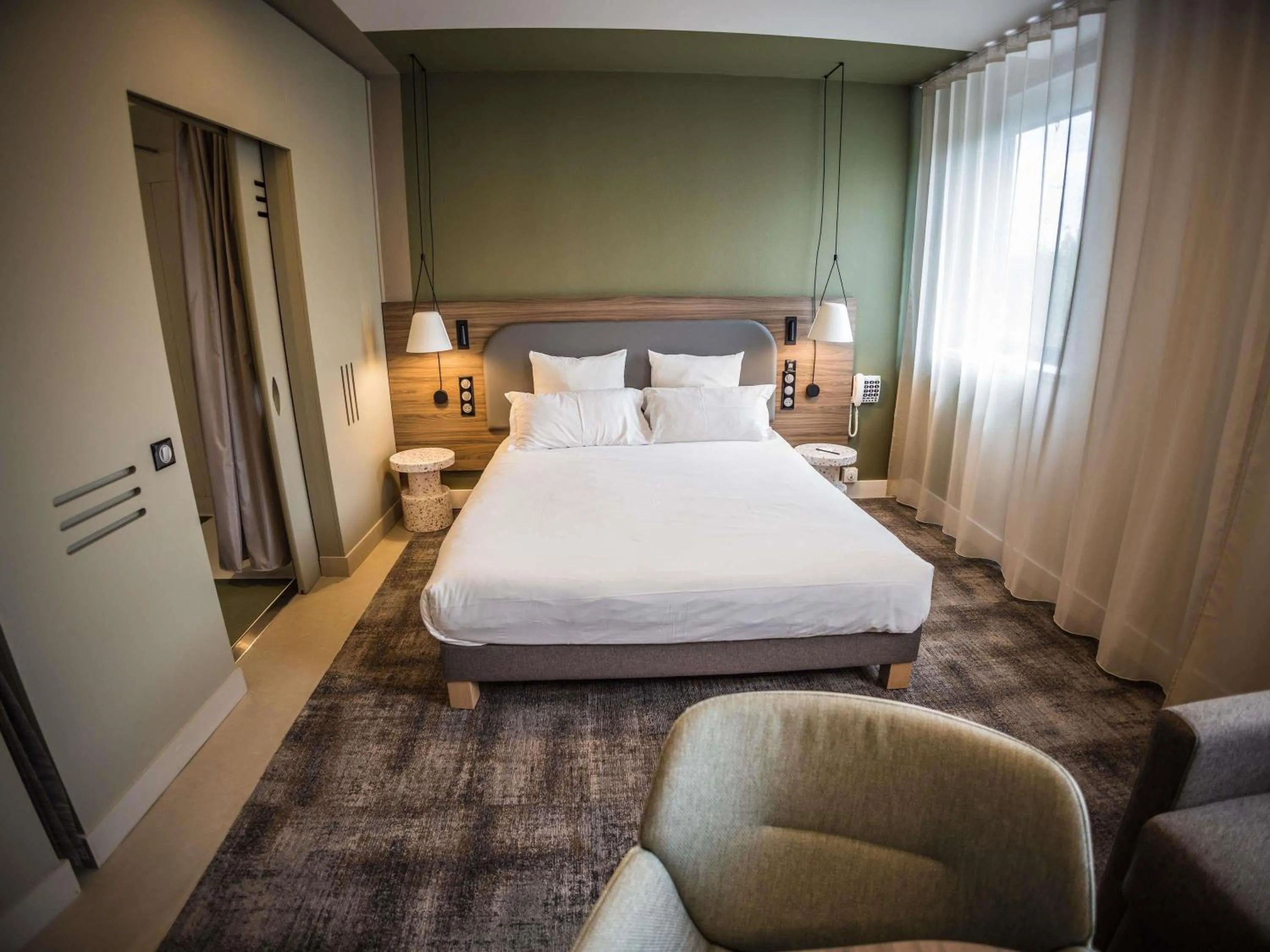 Photo of the whole room, Bed in Novotel Suites Rouen Normandie