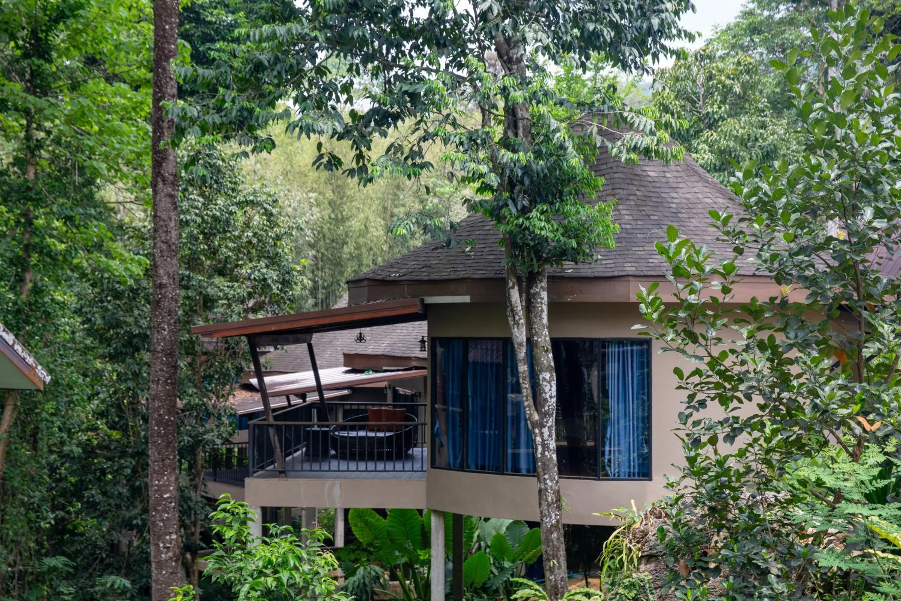 Property building in Rock and Tree House Resort