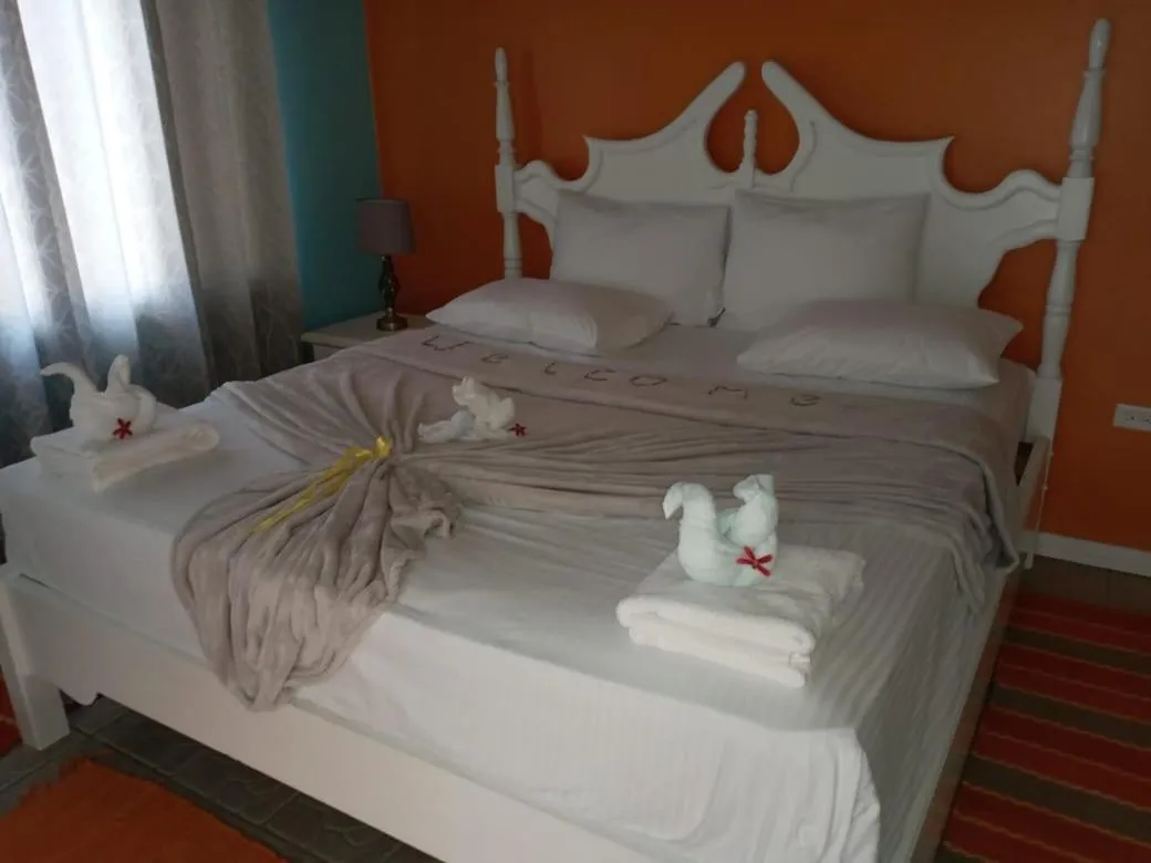 Bed in Castara Inn
