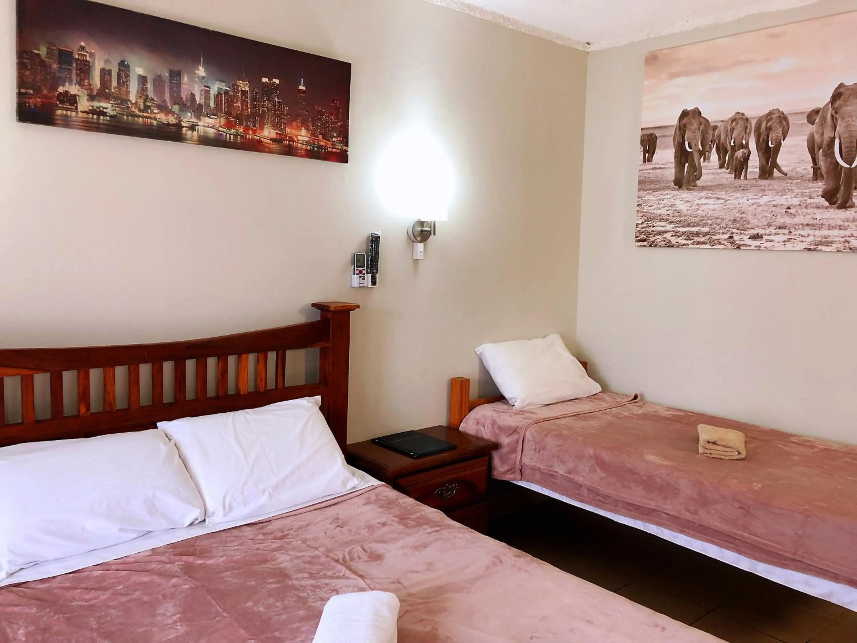 Bed in Central Jetty Motel