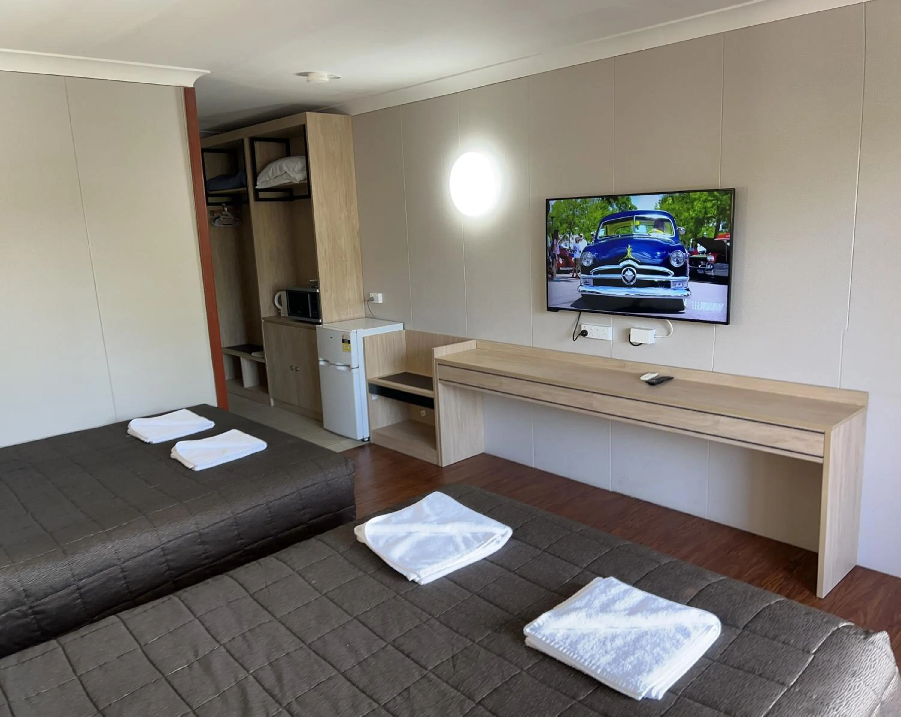 Bed in Central Jetty Motel