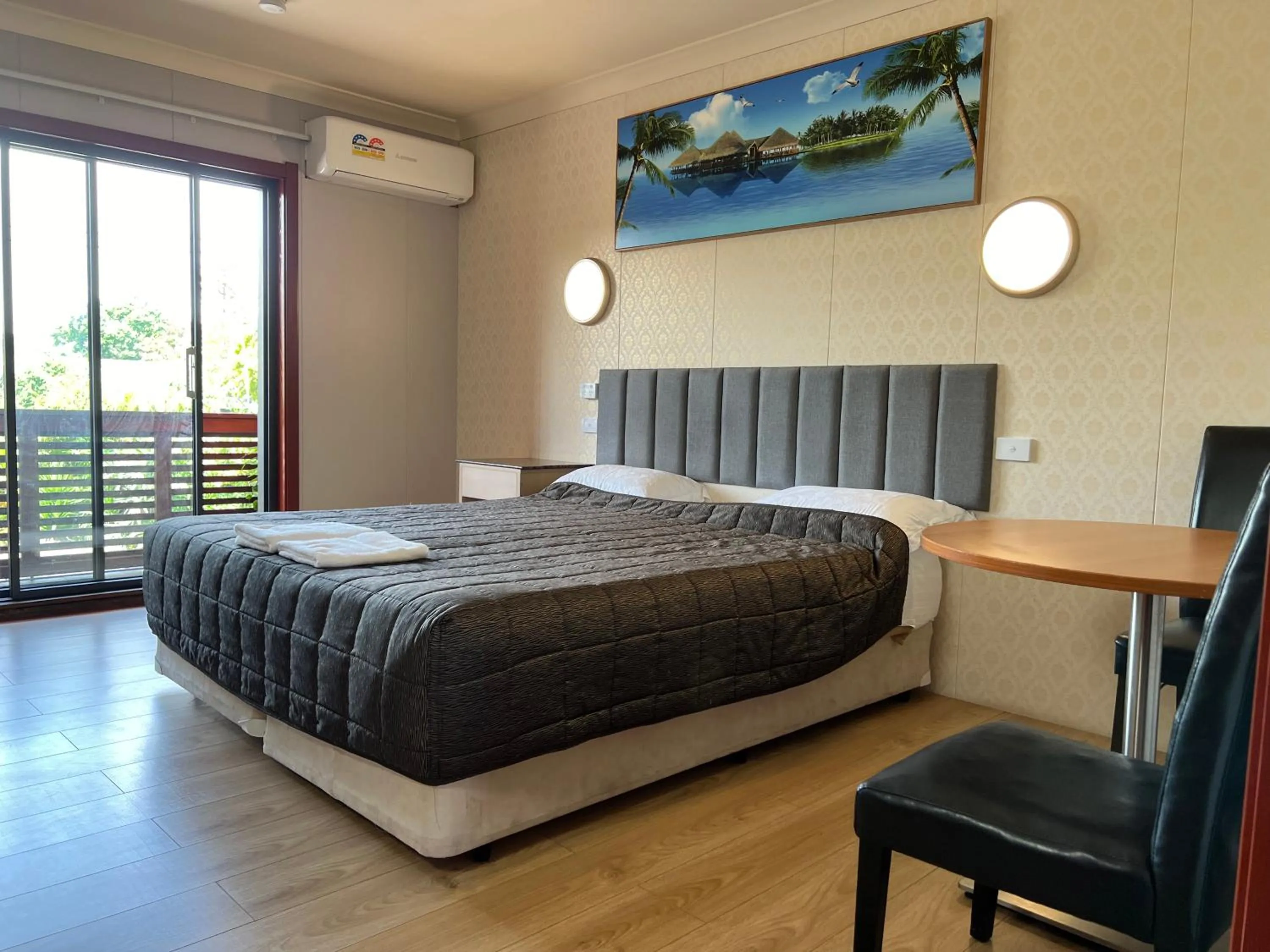 Bed in Central Jetty Motel