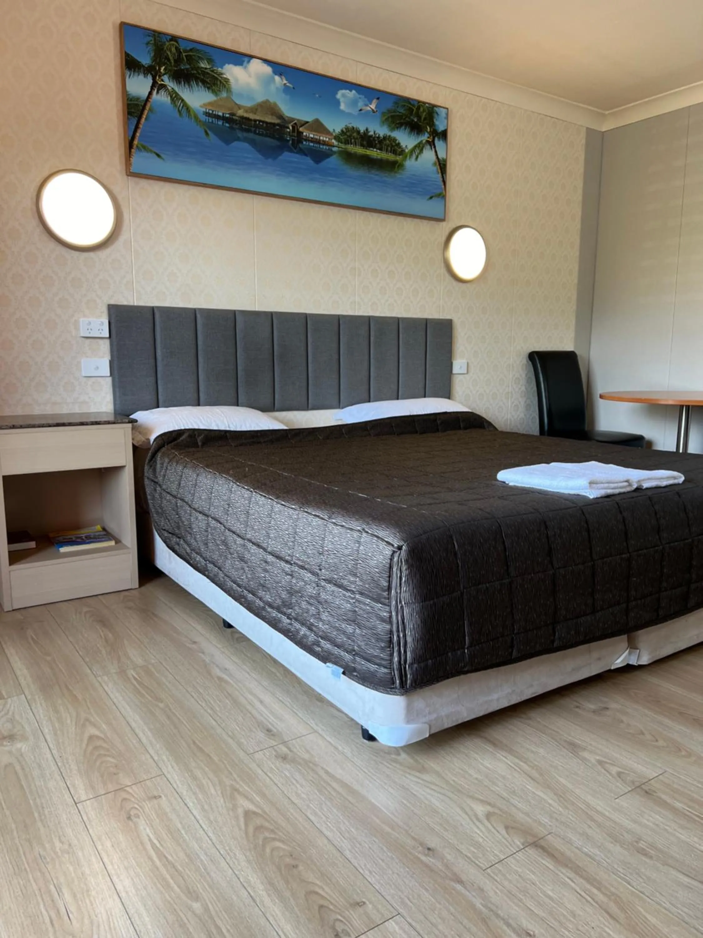 Bed in Central Jetty Motel