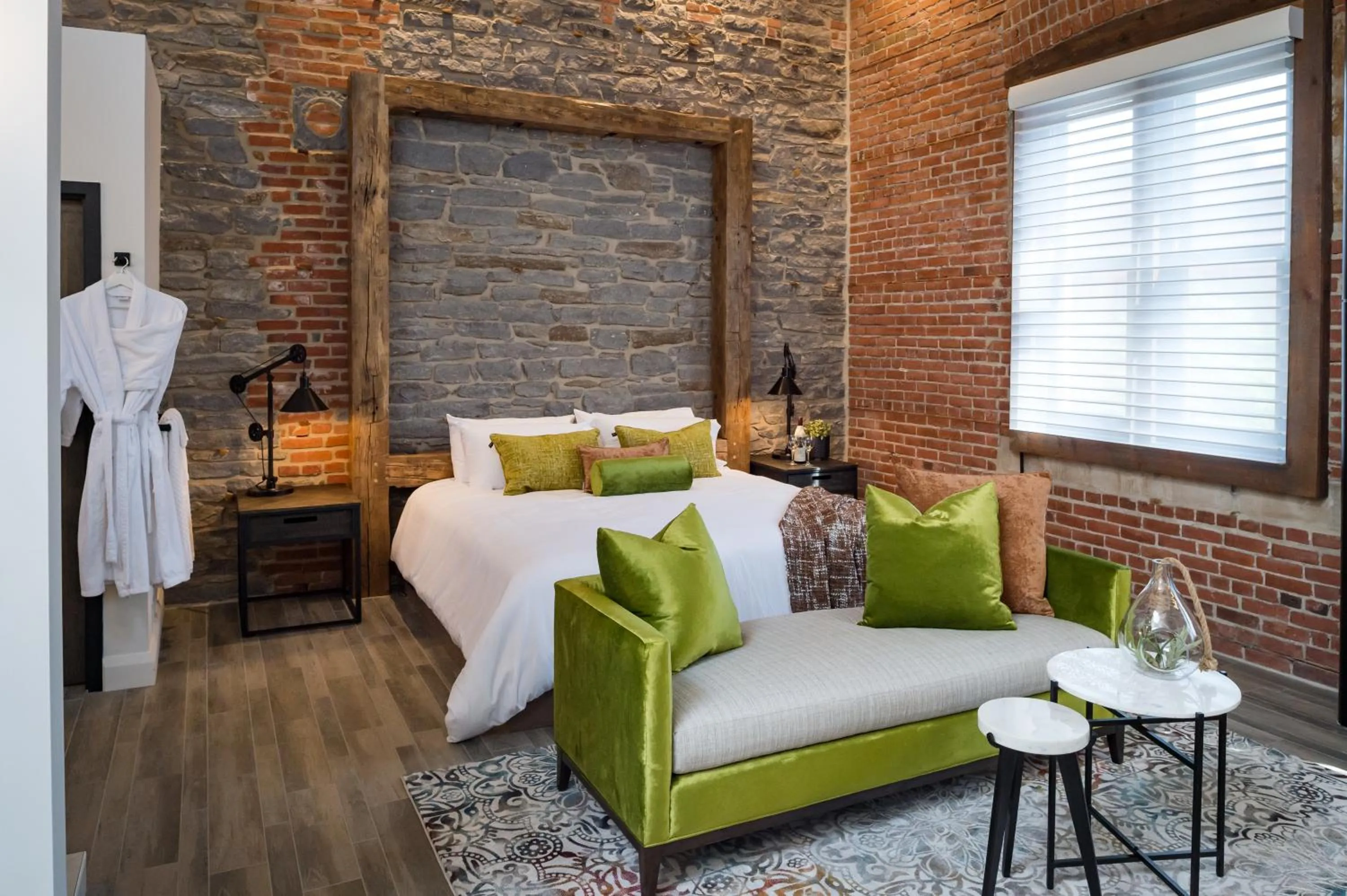 Seating area, Bed in 48 King West Boutique Hotel