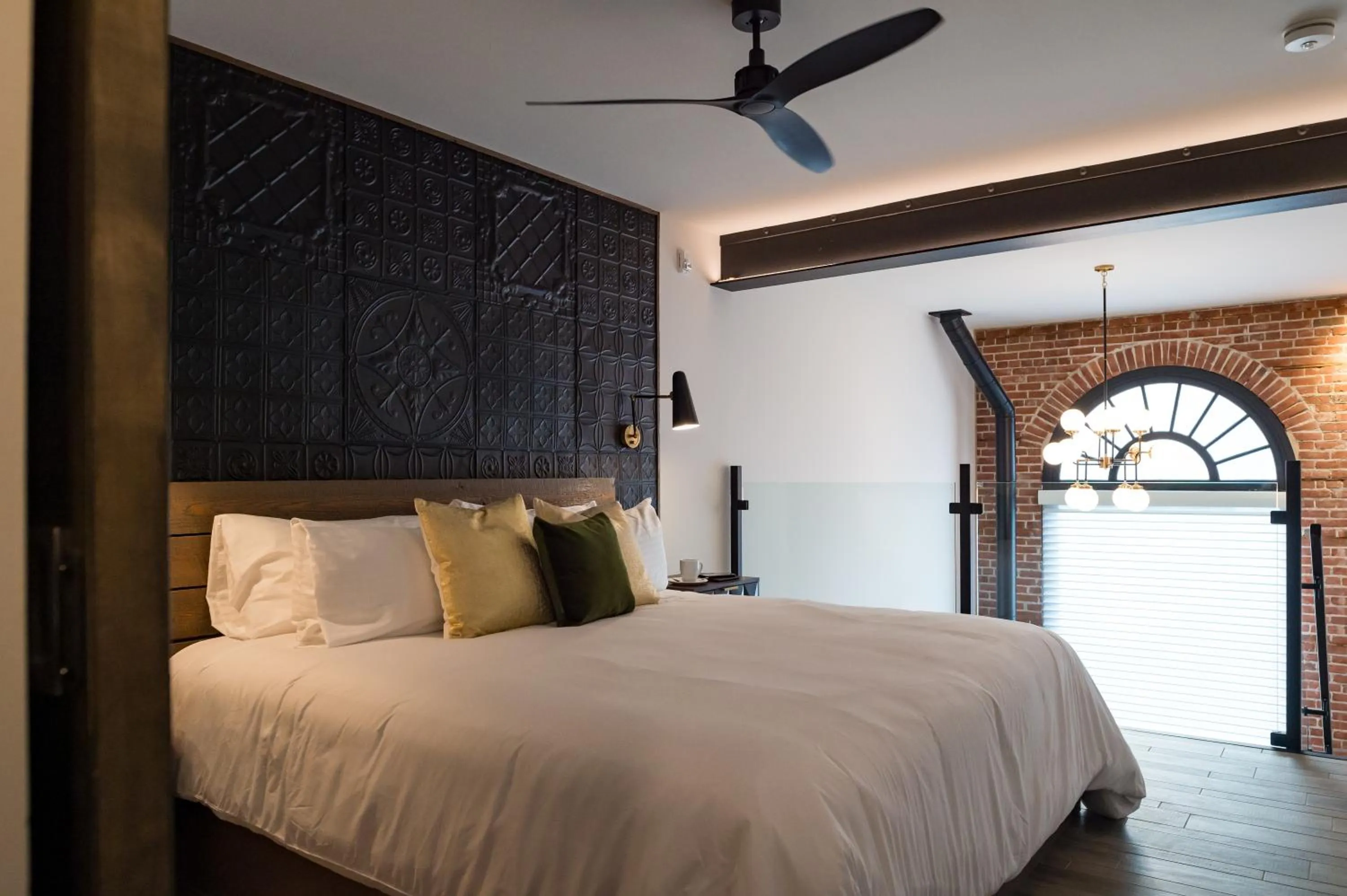 Bed in 48 King West Boutique Hotel