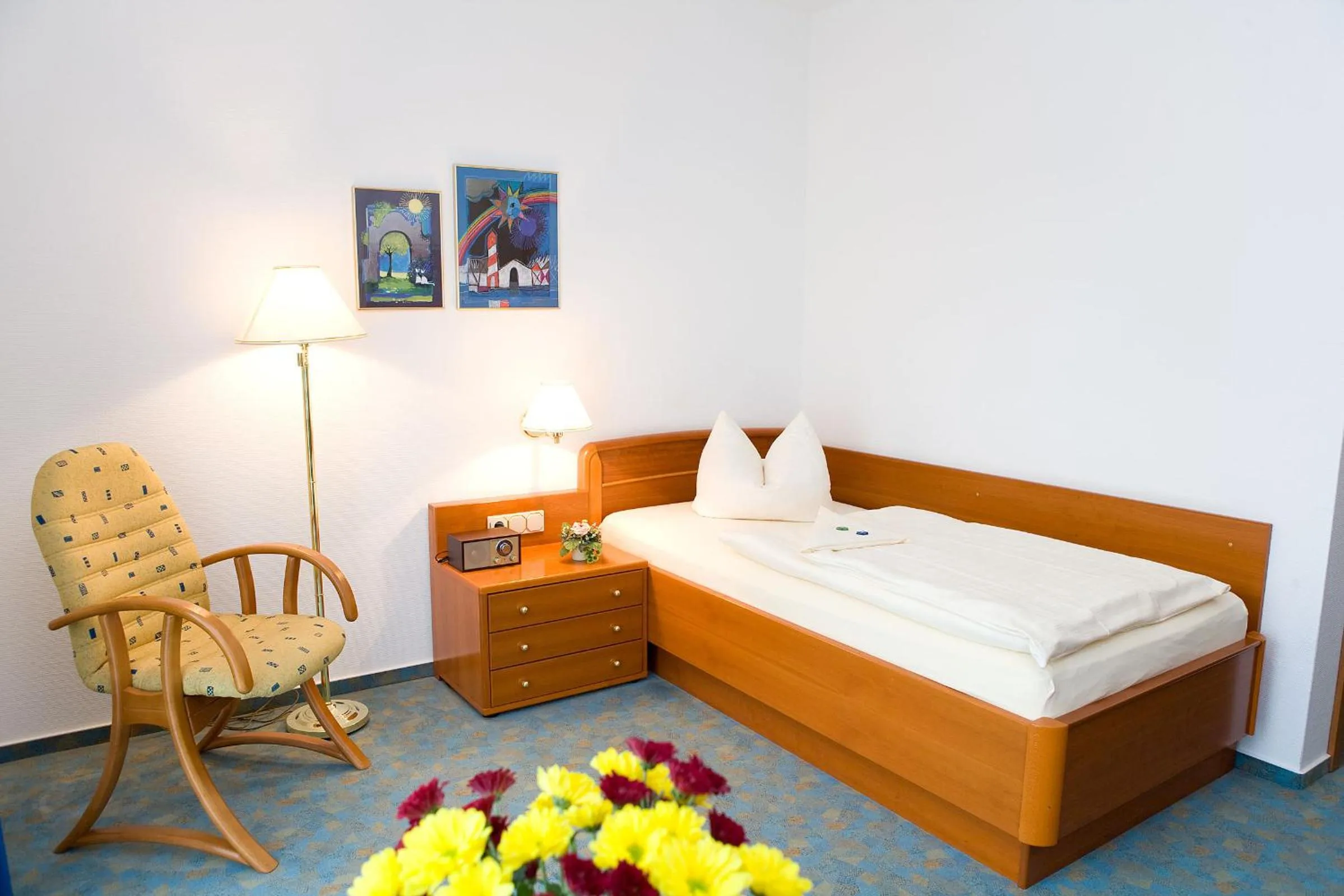 Bed in Central Inn Hotel garni