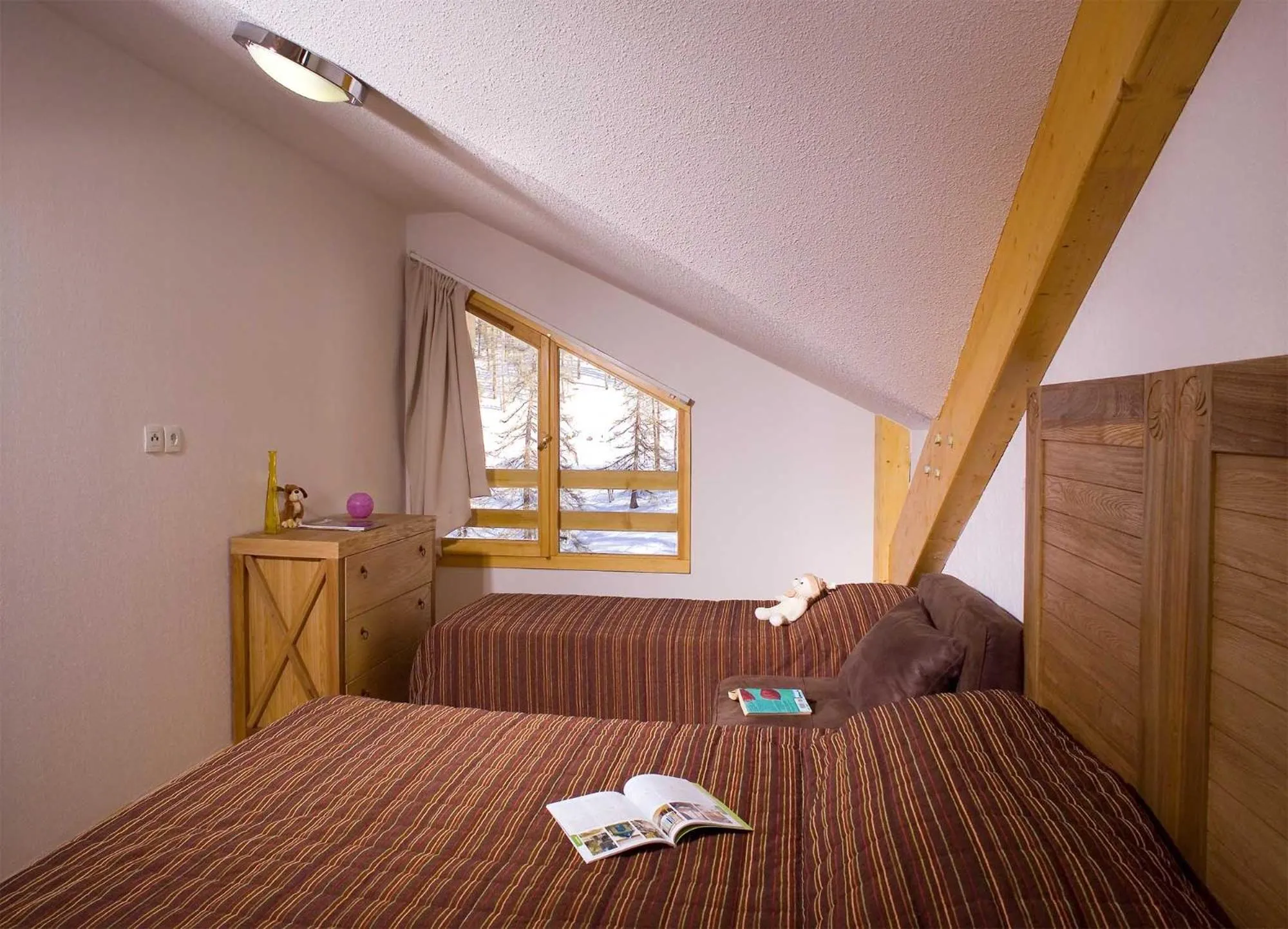 Bed in Madame Vacances Résidence Le Parc Des Airelles