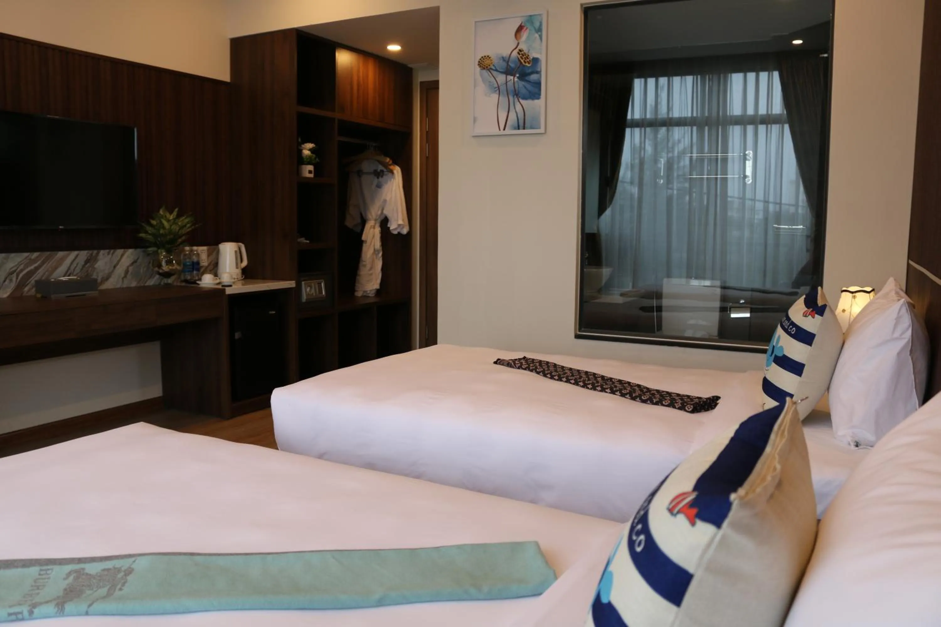 Bed in The Fish Village Villa