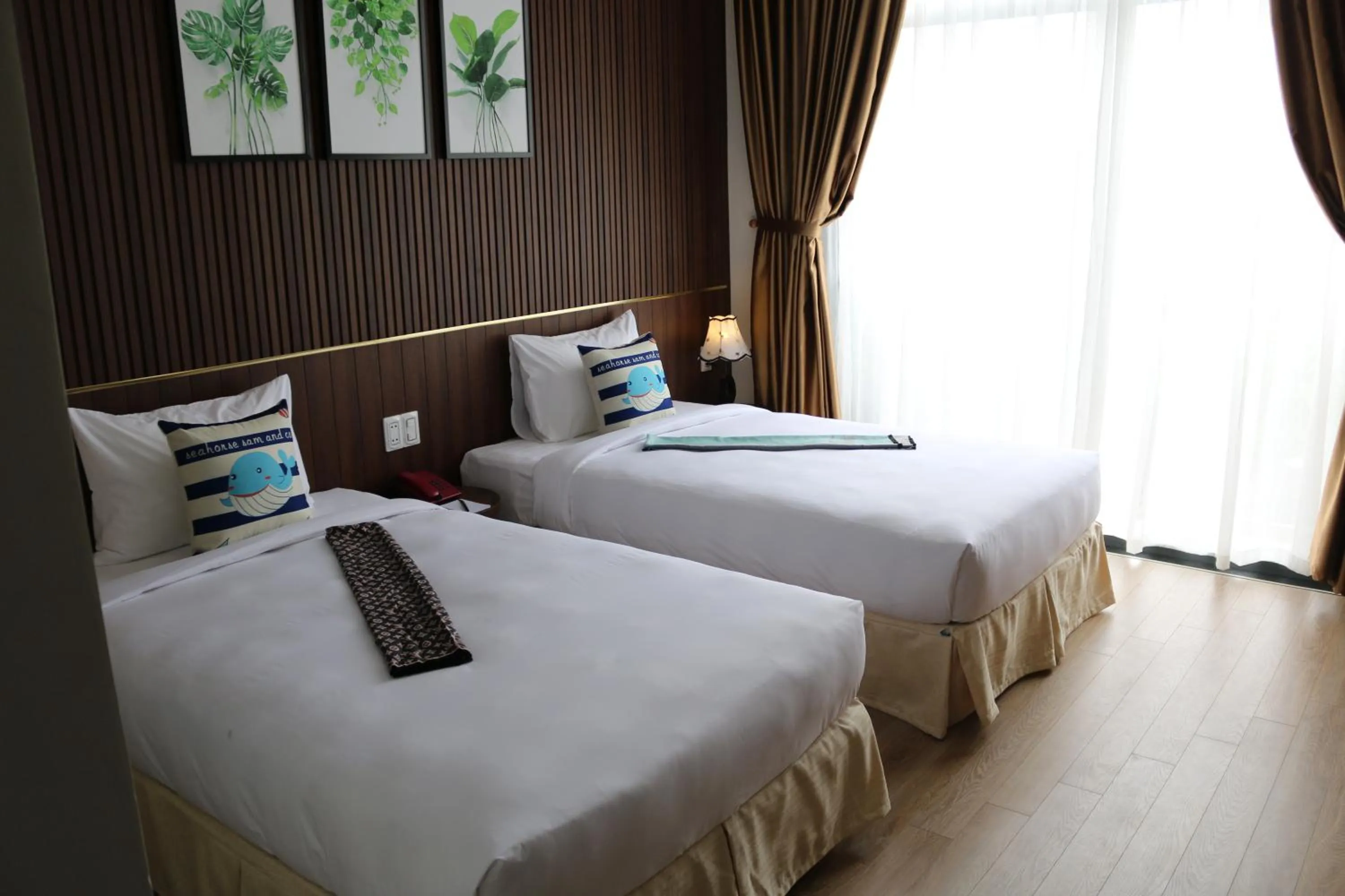 Bed in The Fish Village Villa