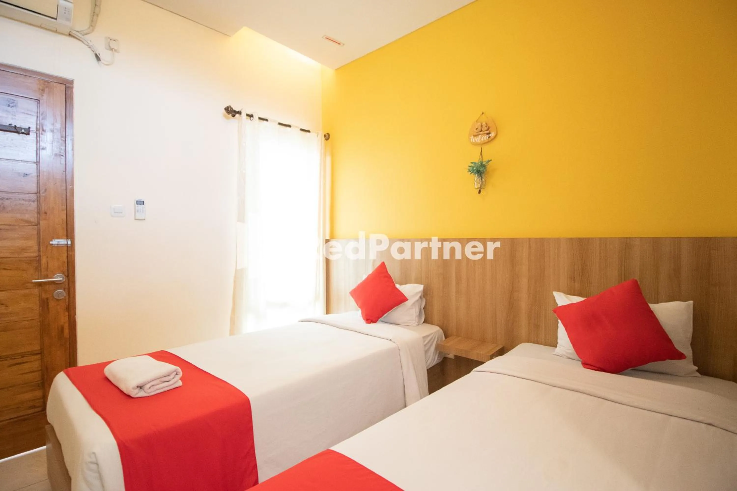 Bedroom, Bed in Griya Damai Syariah Yogyakarta Mitra RedDoorz