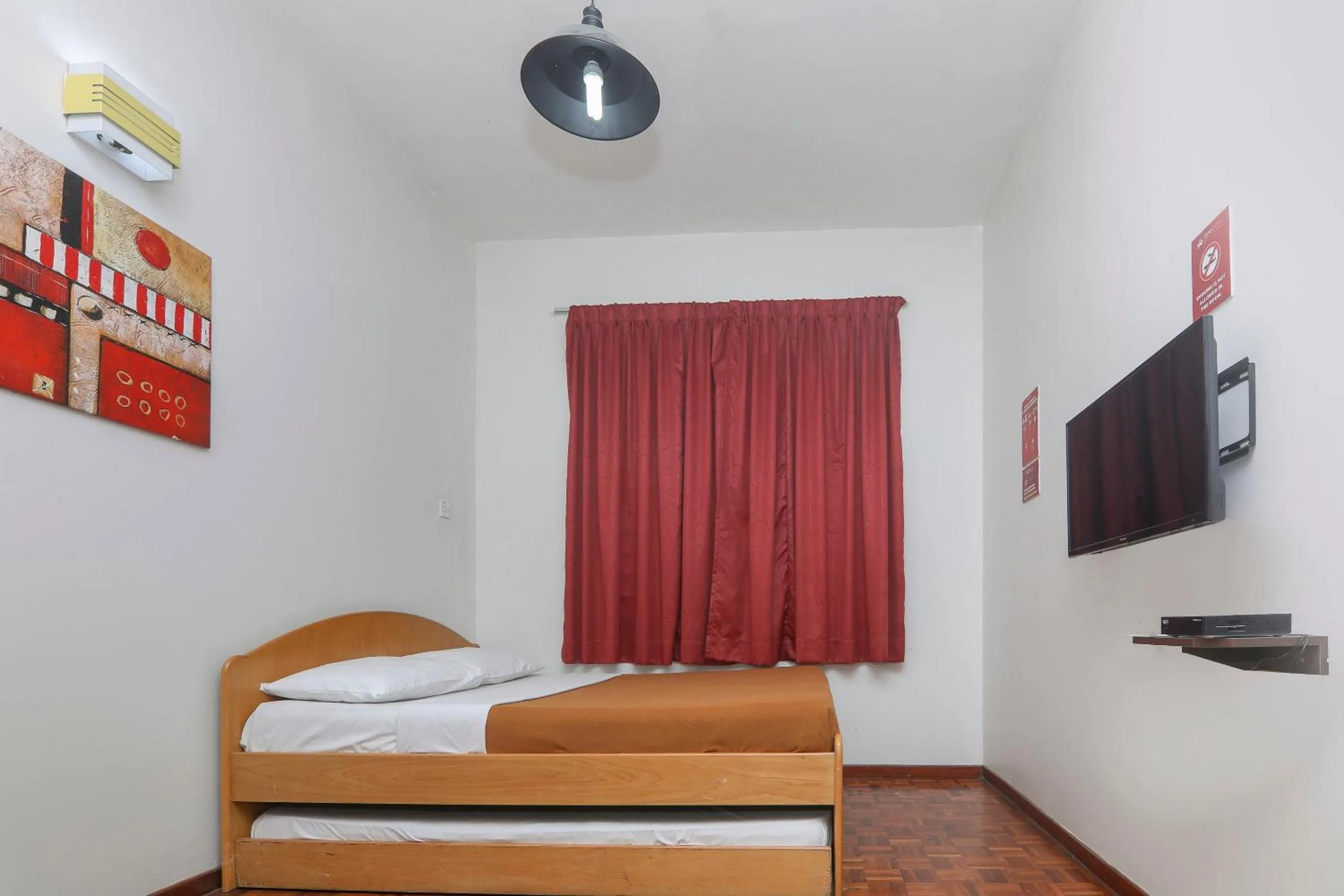 Bedroom, Bed in SPOT ON 89789 Hotel Check In 2