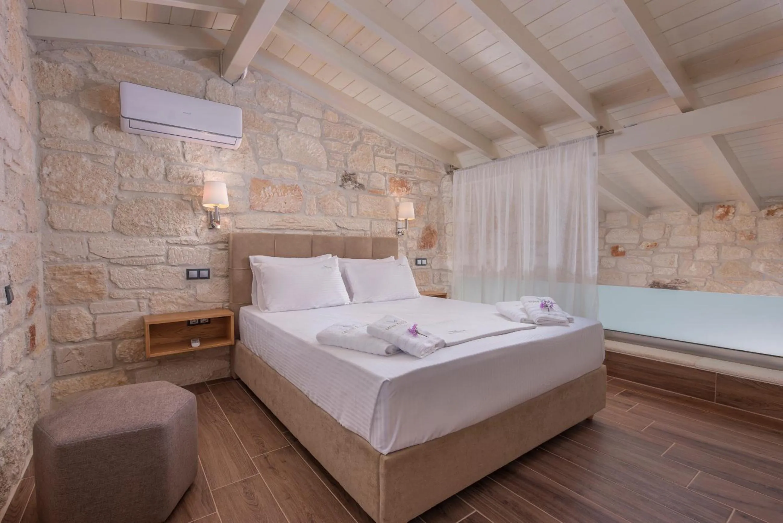 Bed in Mint Retreat Suites