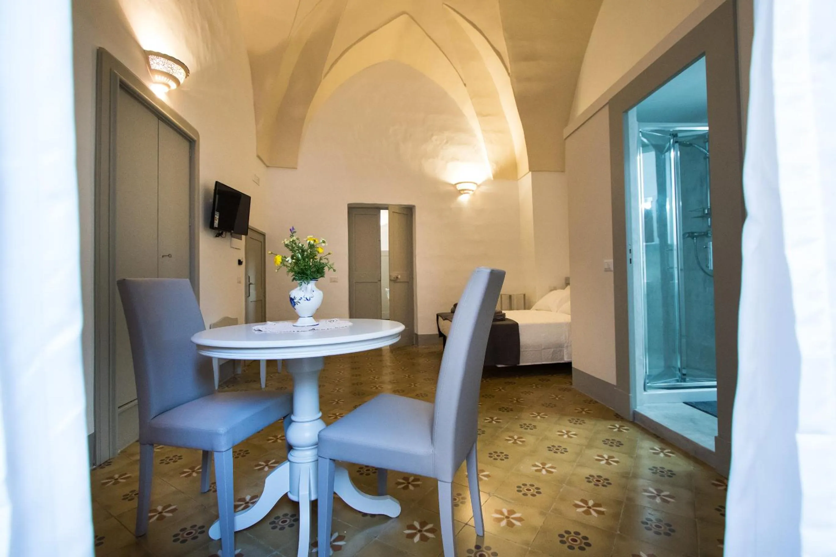 TV and multimedia in Le Finestre Su Porta Carrese - Luxury Rooms