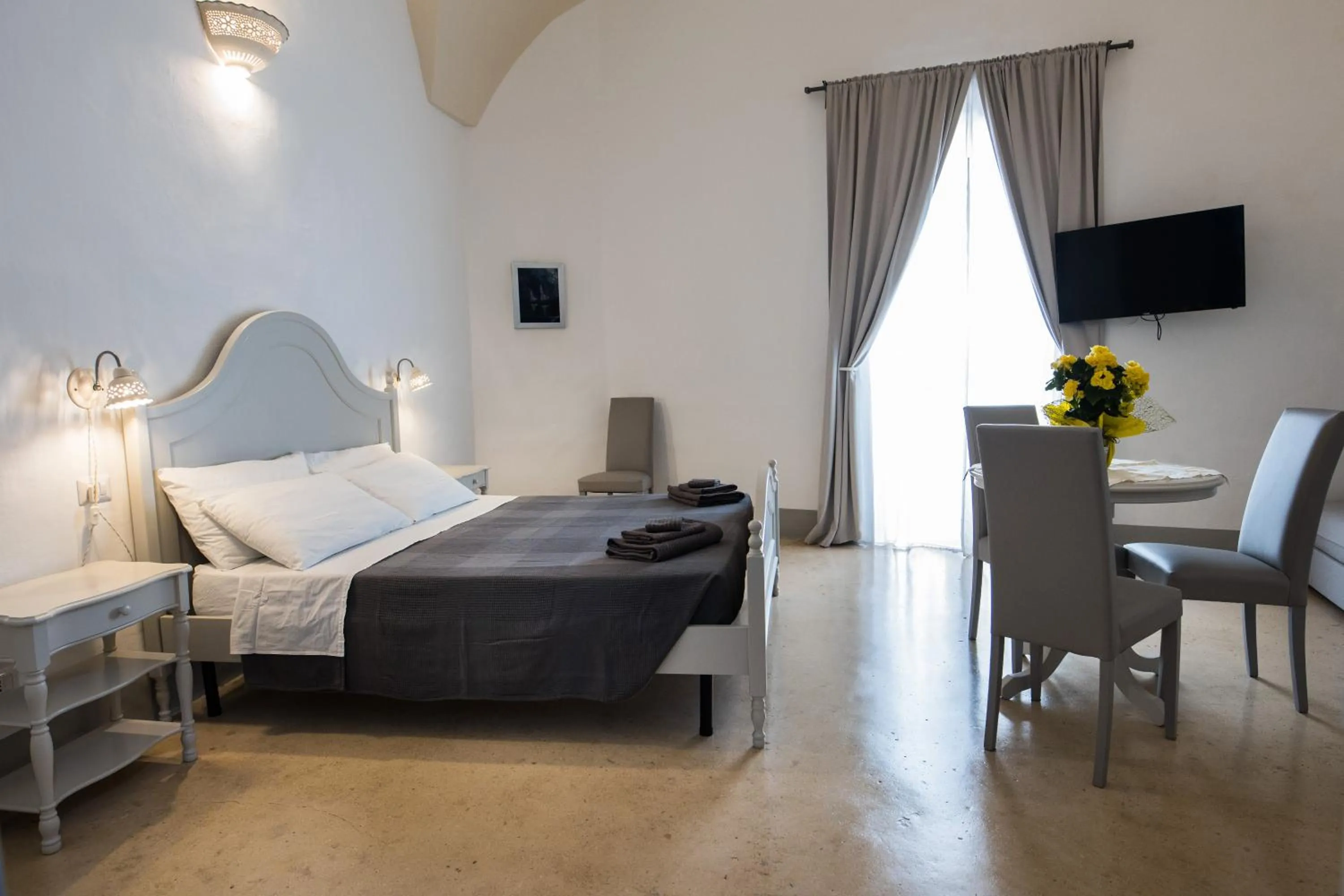 Bed in Le Finestre Su Porta Carrese - Luxury Rooms
