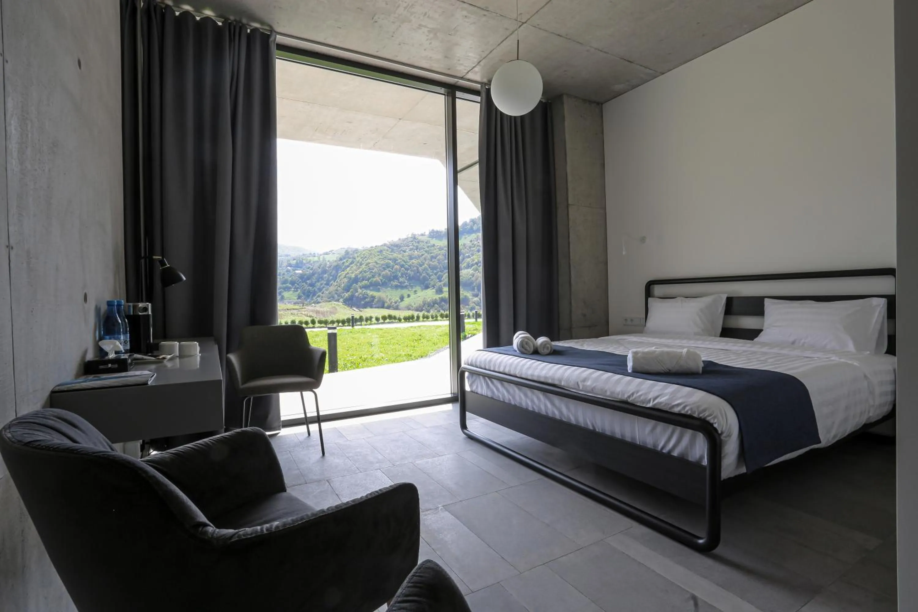 Seating area, Bed in Concept Hotel by COAF