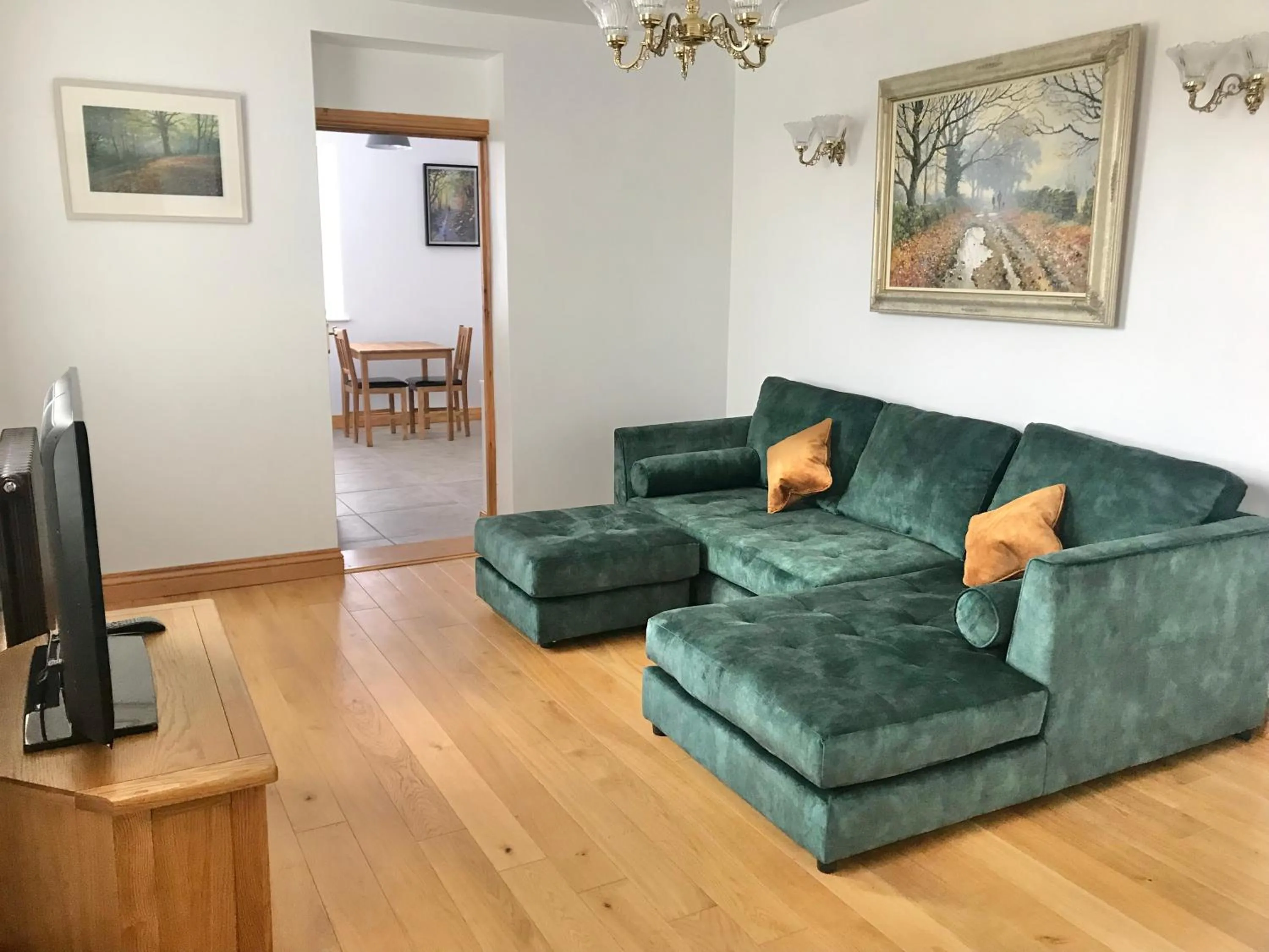 Communal lounge/ TV room in Marehay Hall Farm