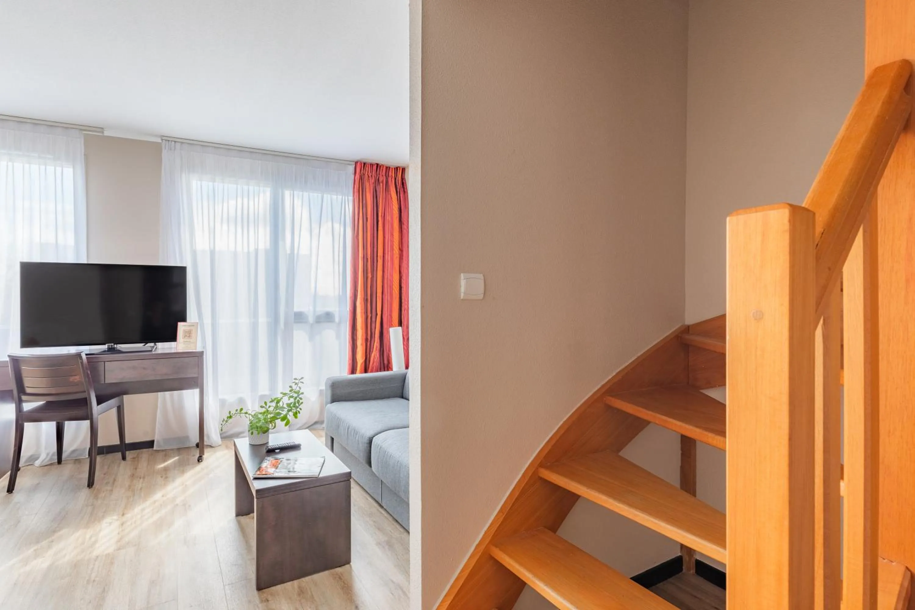 Bedroom in Appart’City Confort Nantes Ouest Saint-Herblain