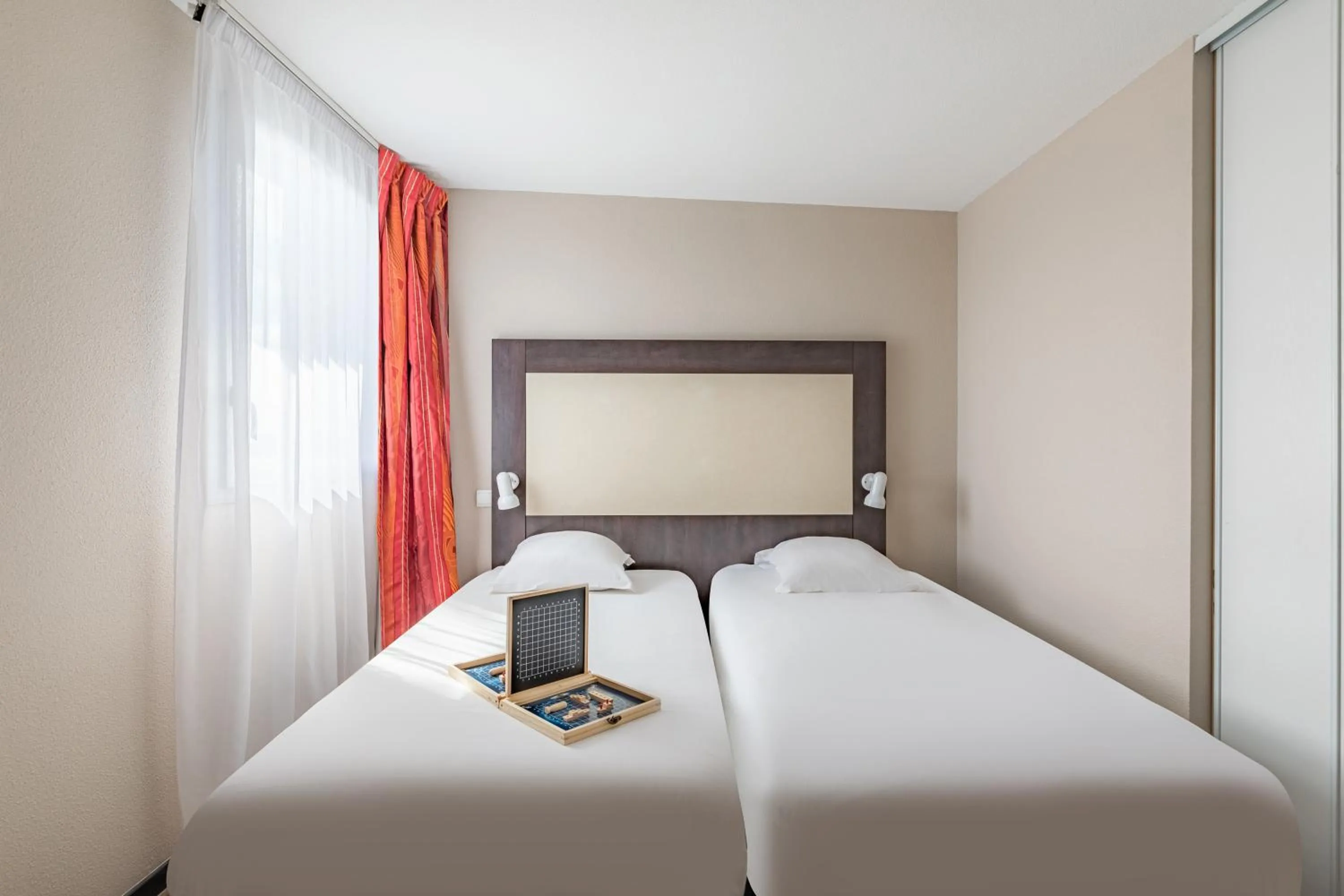 Bed in Appart’City Confort Nantes Ouest Saint-Herblain