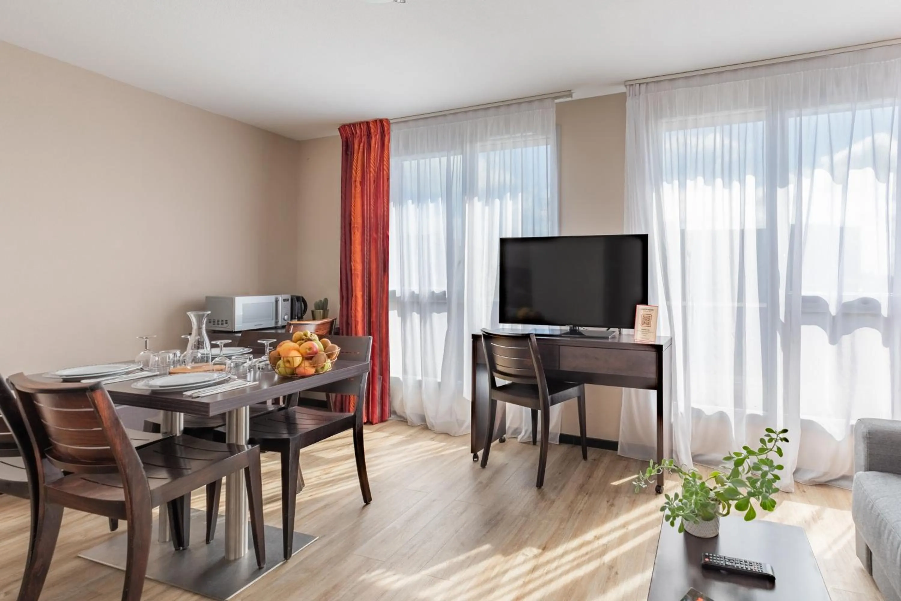 Living room in Appart’City Confort Nantes Ouest Saint-Herblain