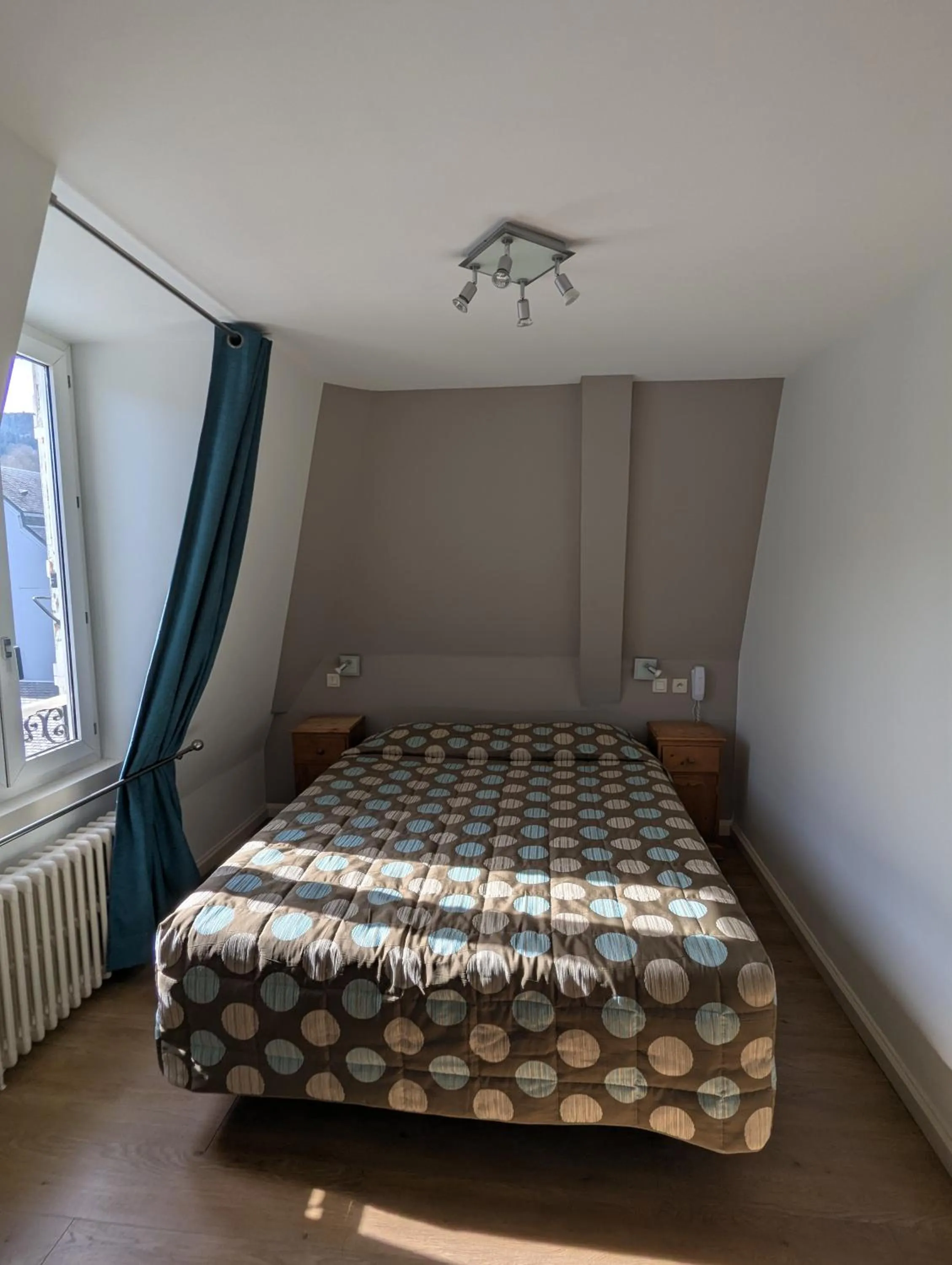 Bedroom, Bed in Logis Hôtel Regina