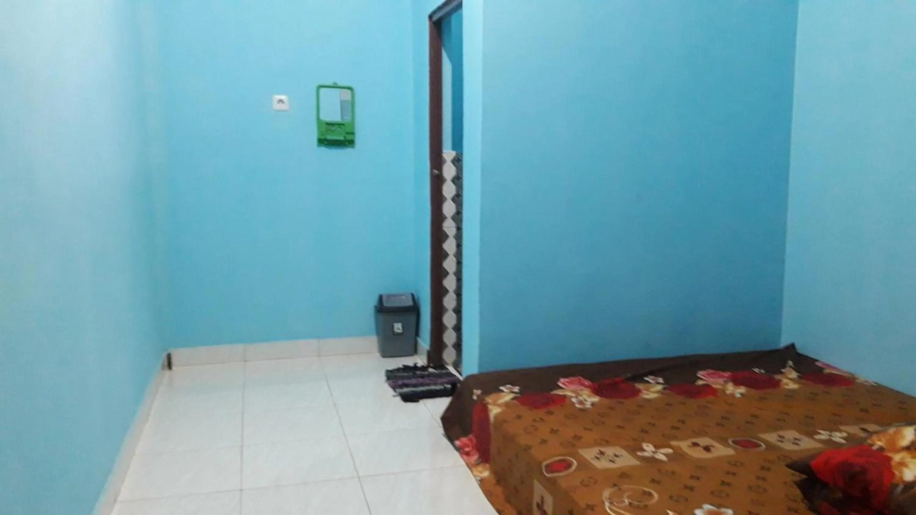 Bedroom in Penginapan asidik