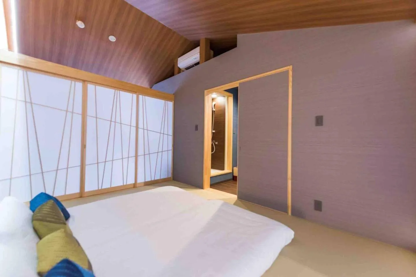 Bed in TABITABI STAY MOONLIGHT