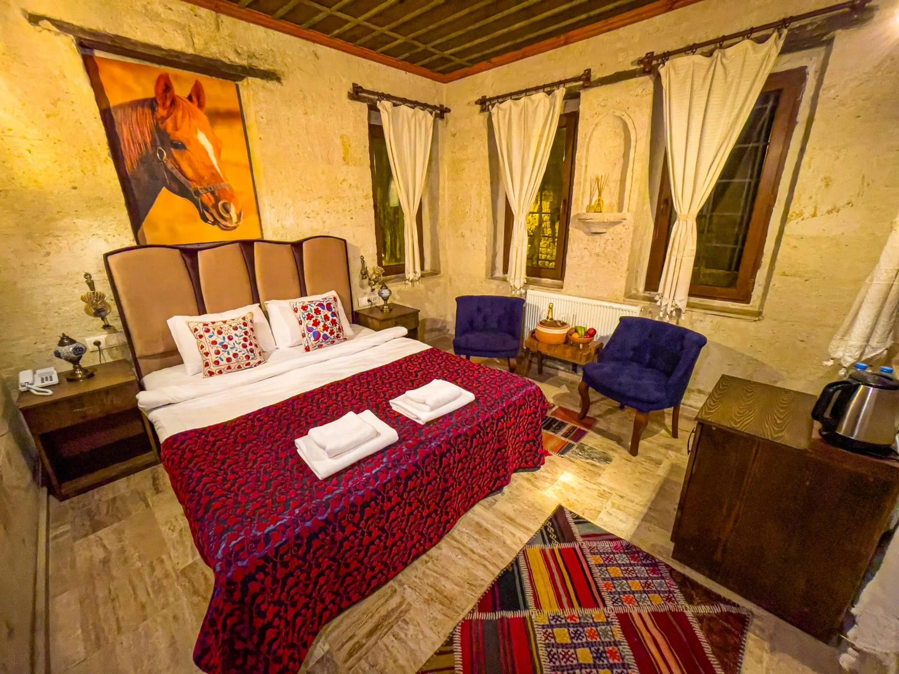 Bed in Heritage Cave Suites