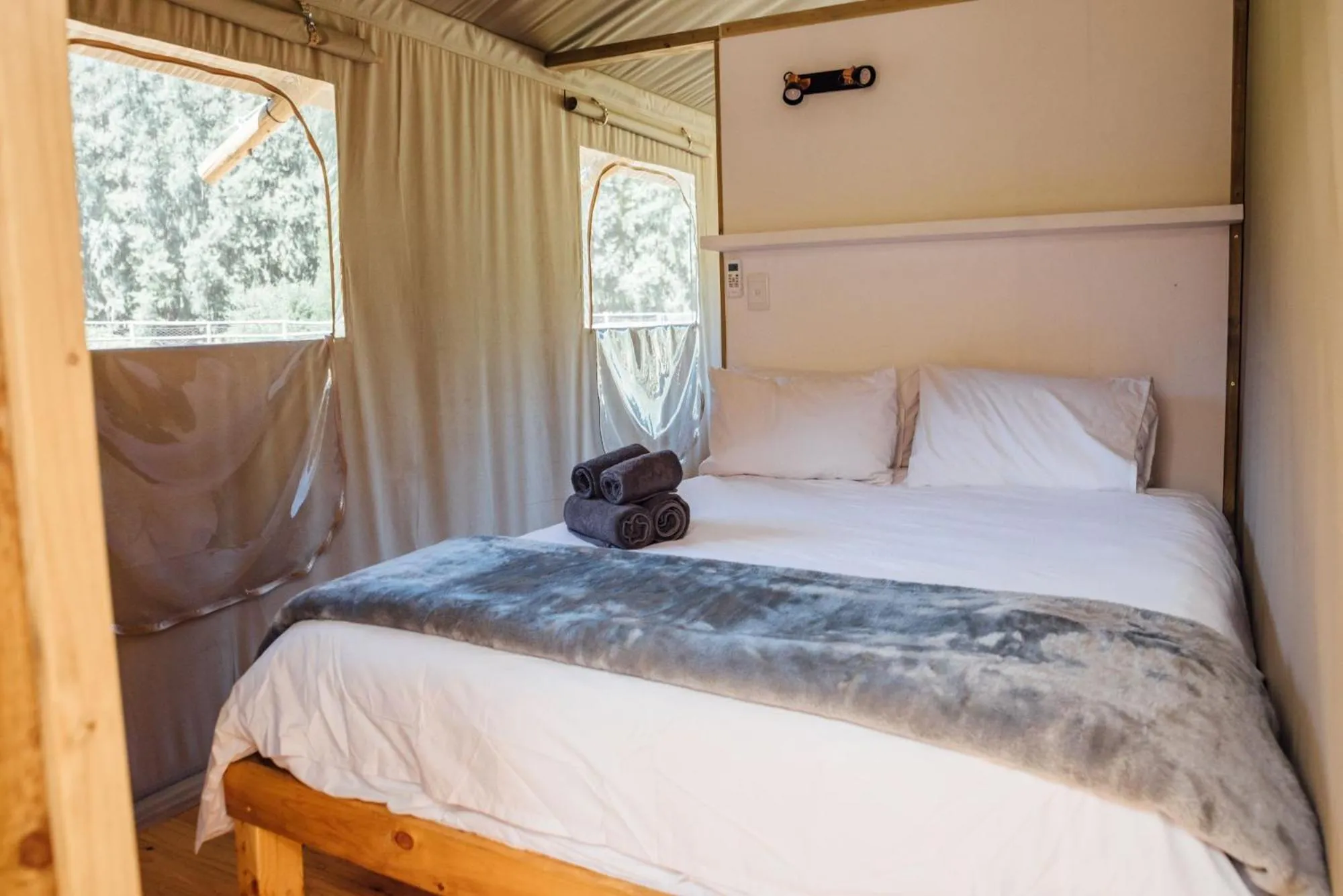 Bed in AfriCamps at White Elephant Safaris