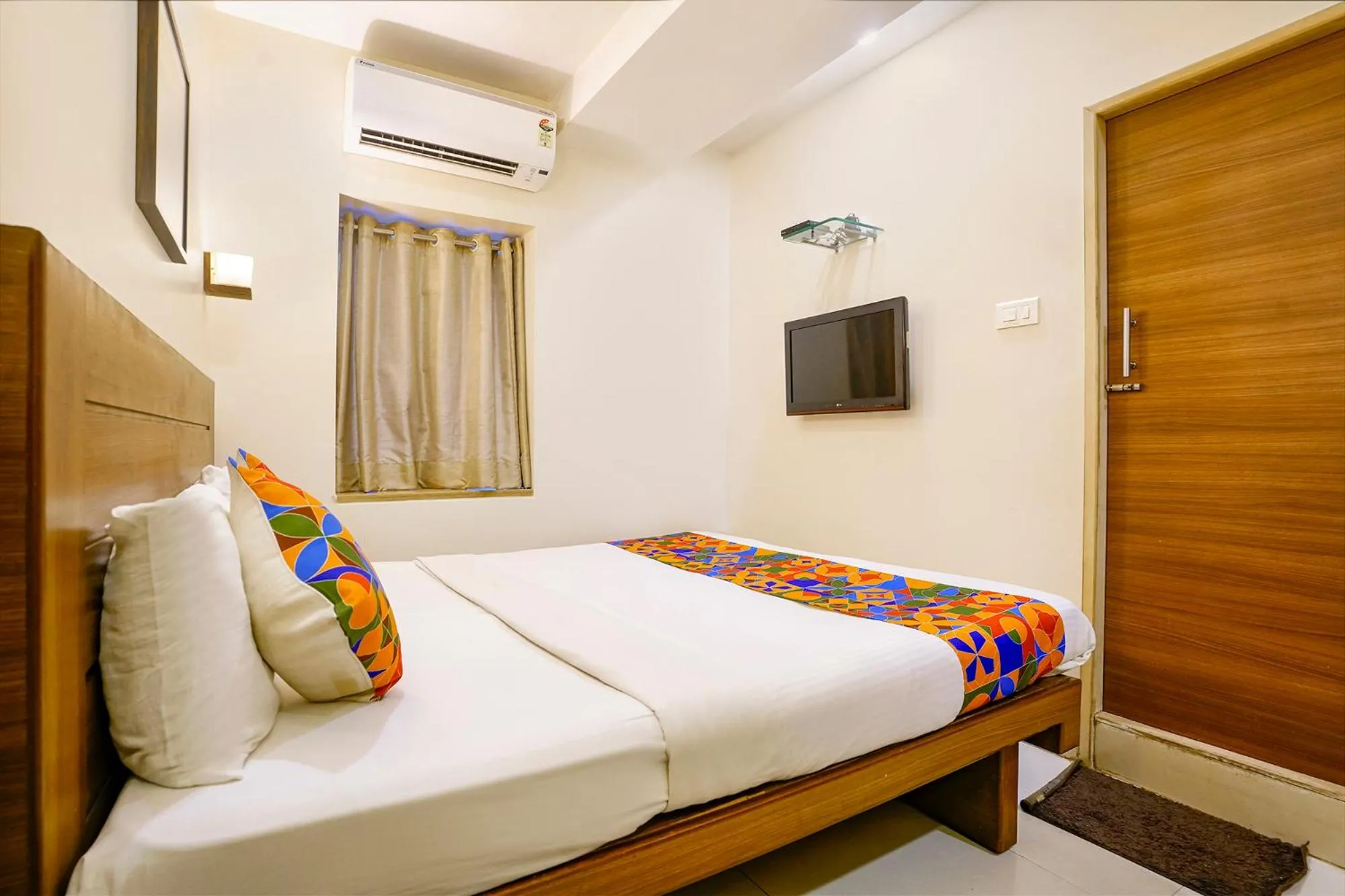 Bed in FabHotel Rahat