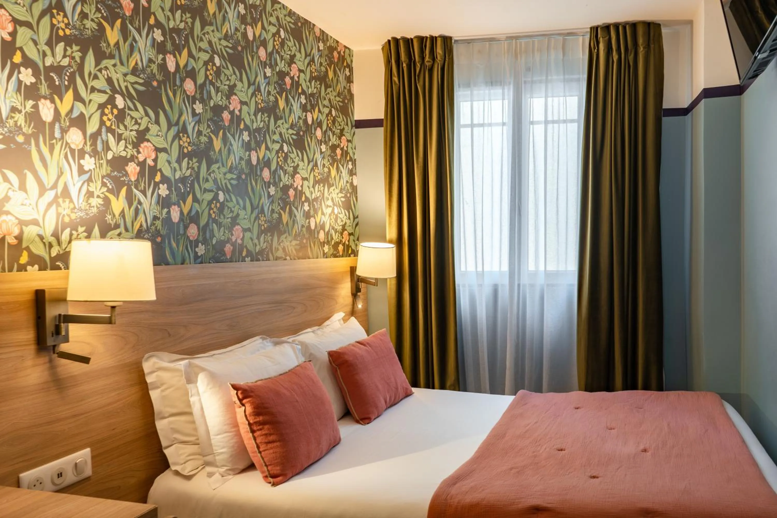 Bed in Hôtel de France, un hôtel AMMI