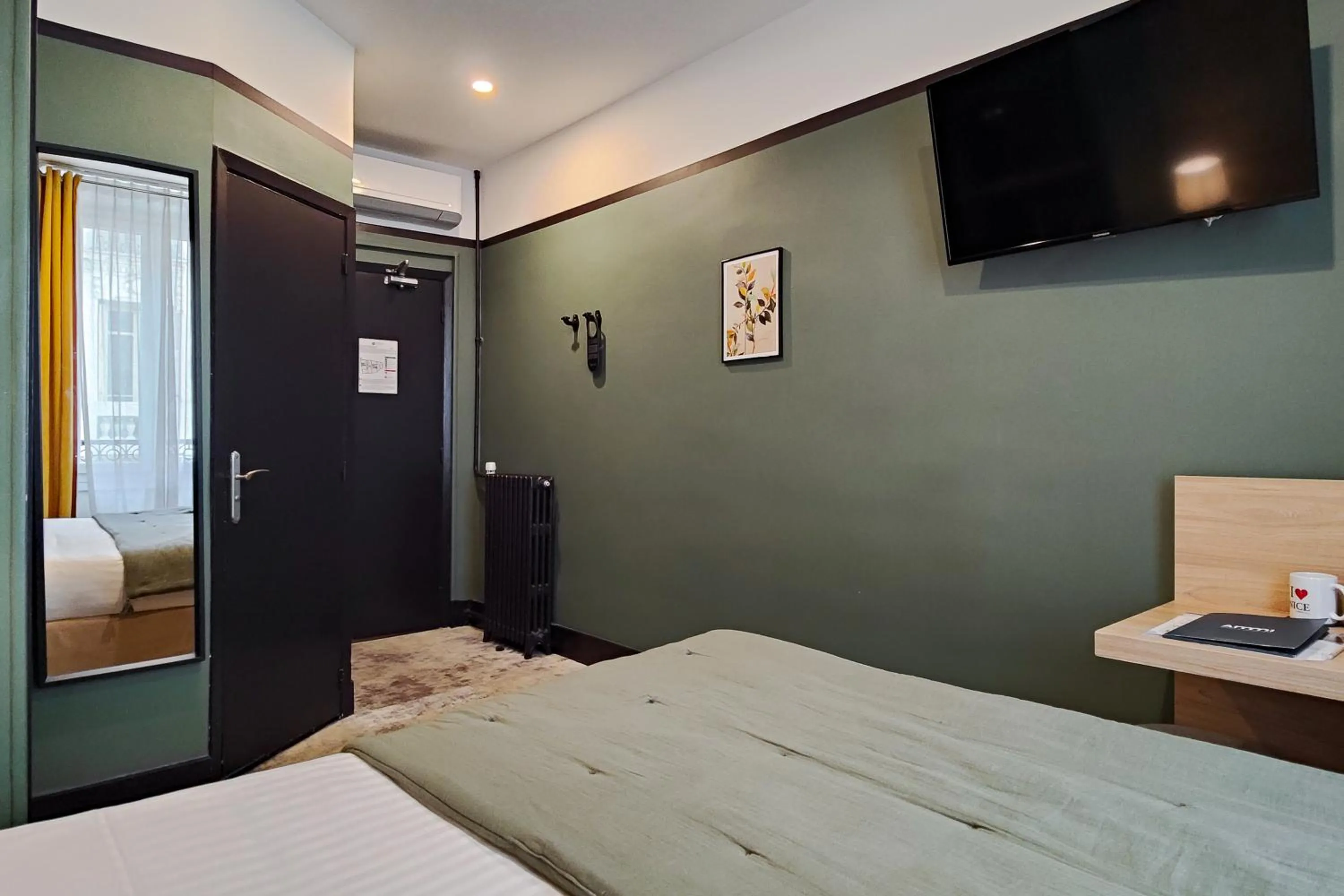 Photo of the whole room, Bed in Hôtel de France, un hôtel AMMI