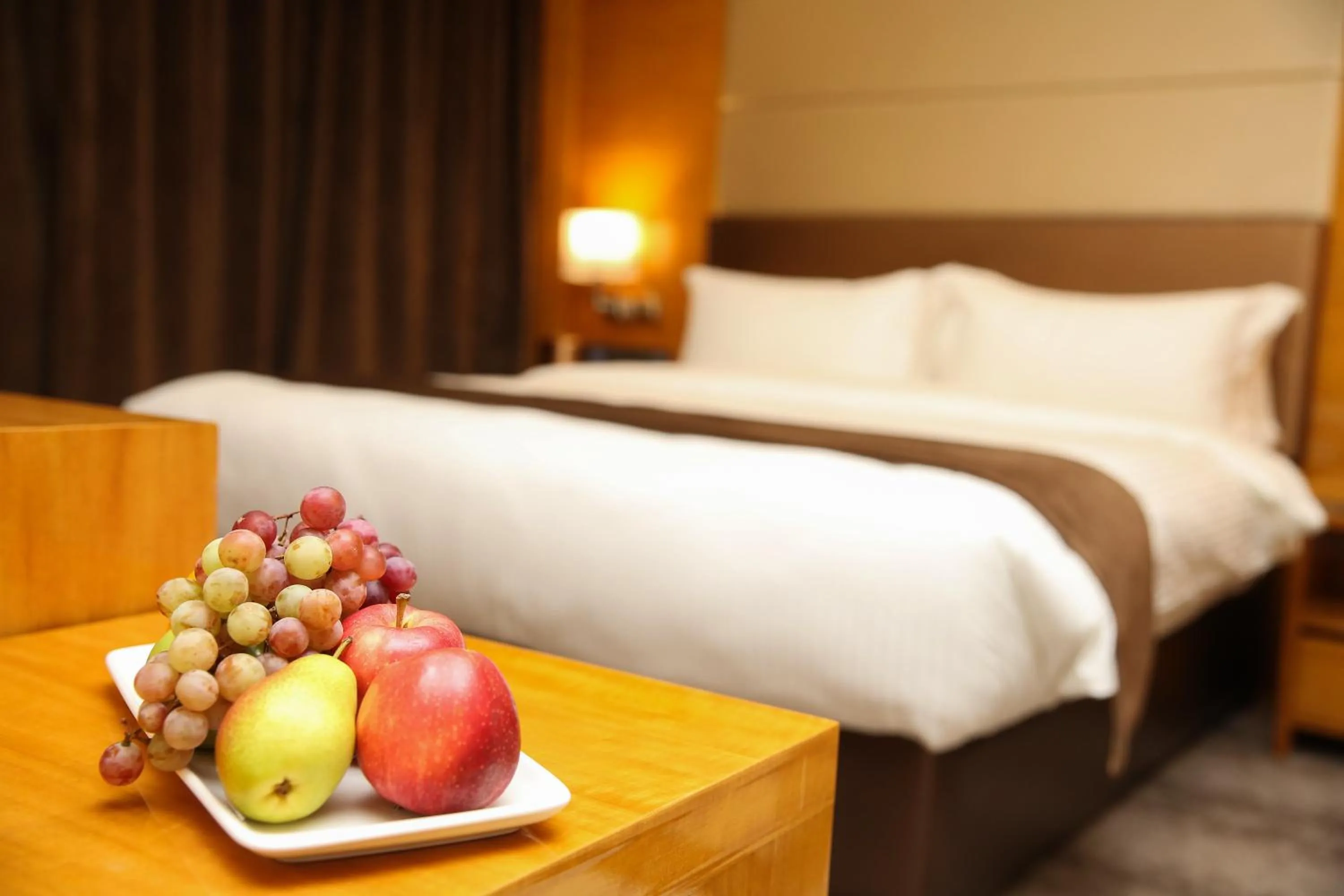 Bed in Gloria Hotel Amman