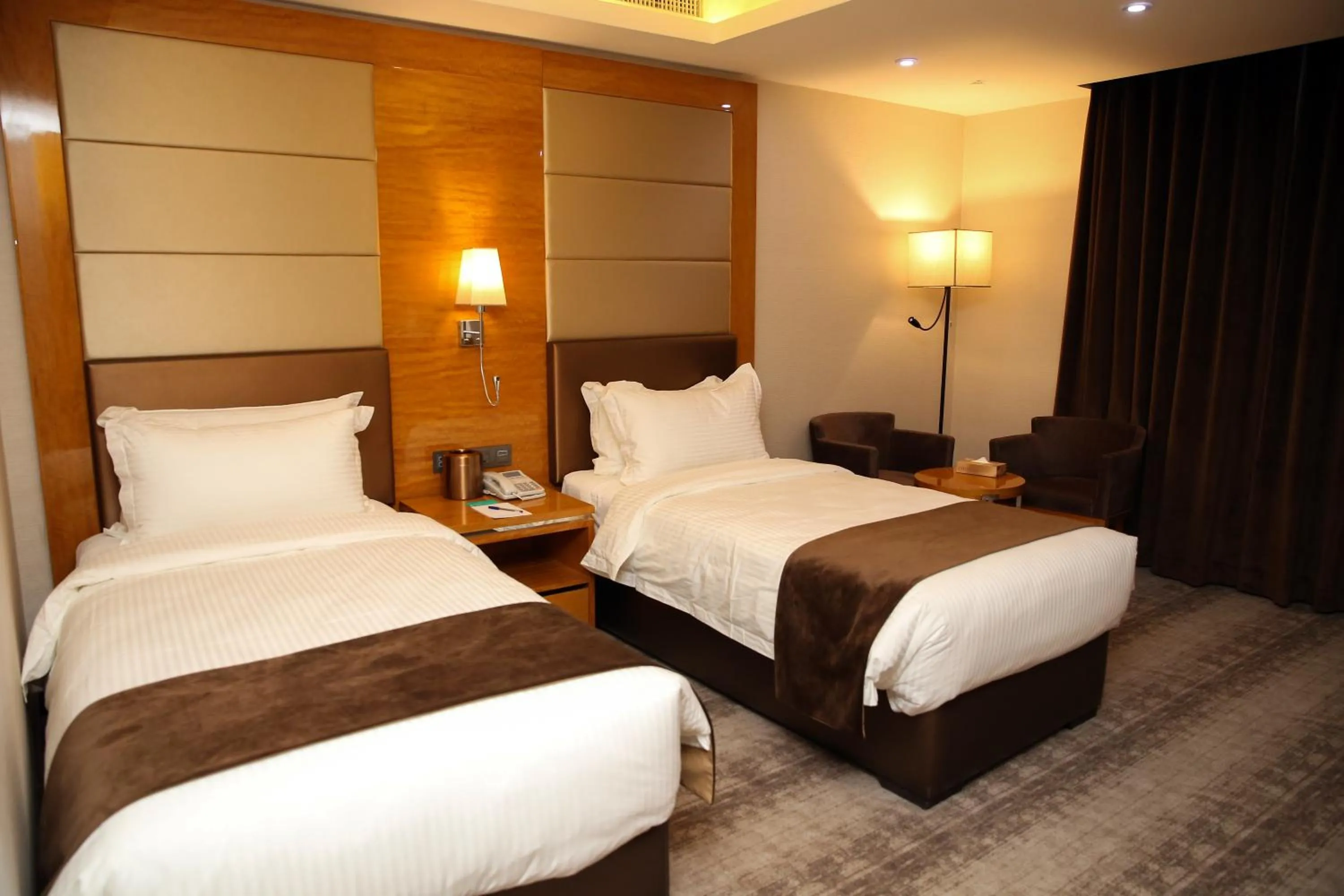 Bed in Gloria Hotel Amman