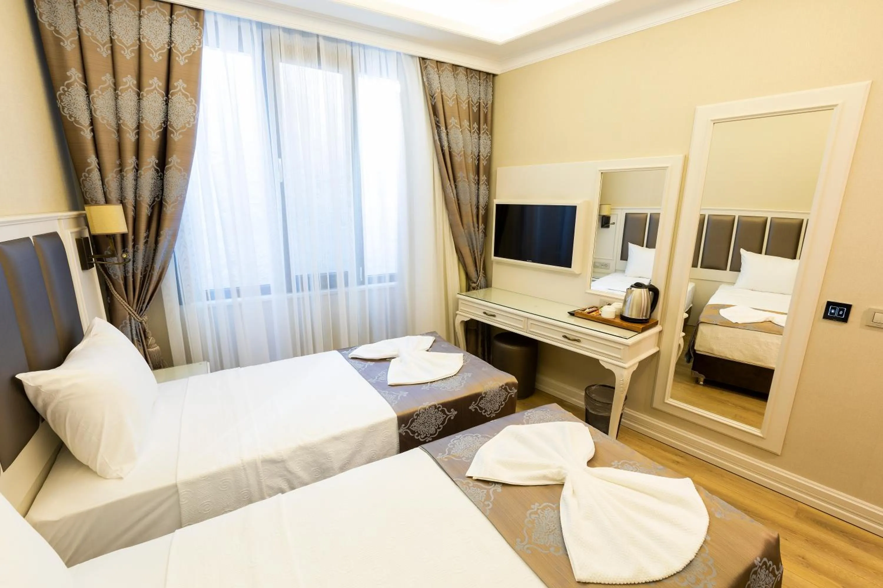 Bed in Villa Sweet Hotel