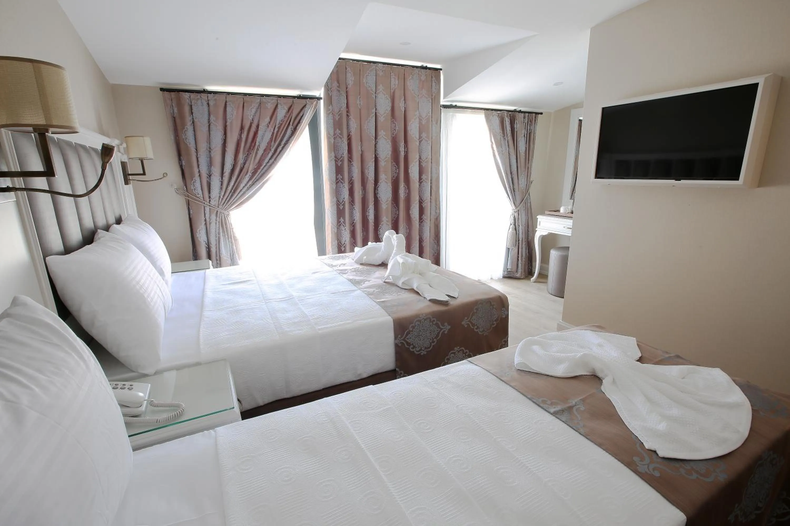 Bed in Villa Sweet Hotel