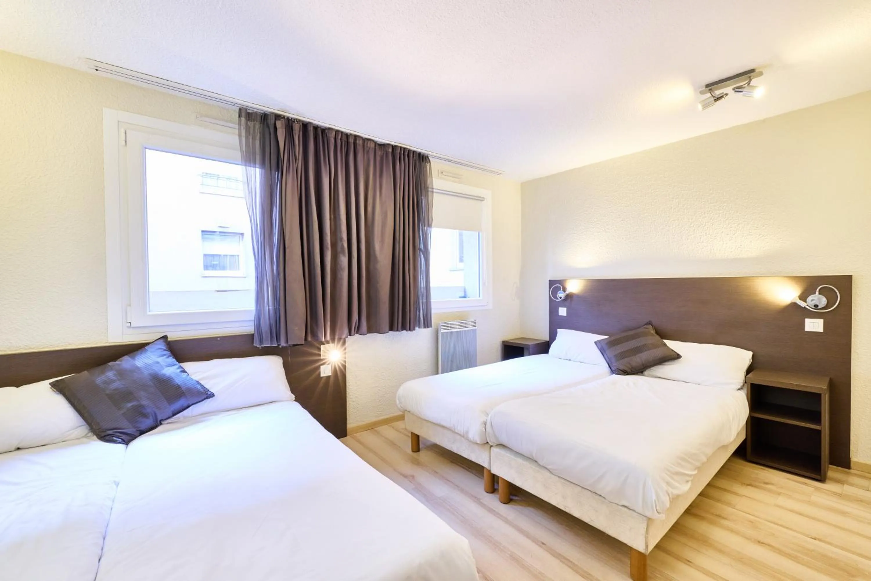 Bed in Hotel Primo Colmar Centre