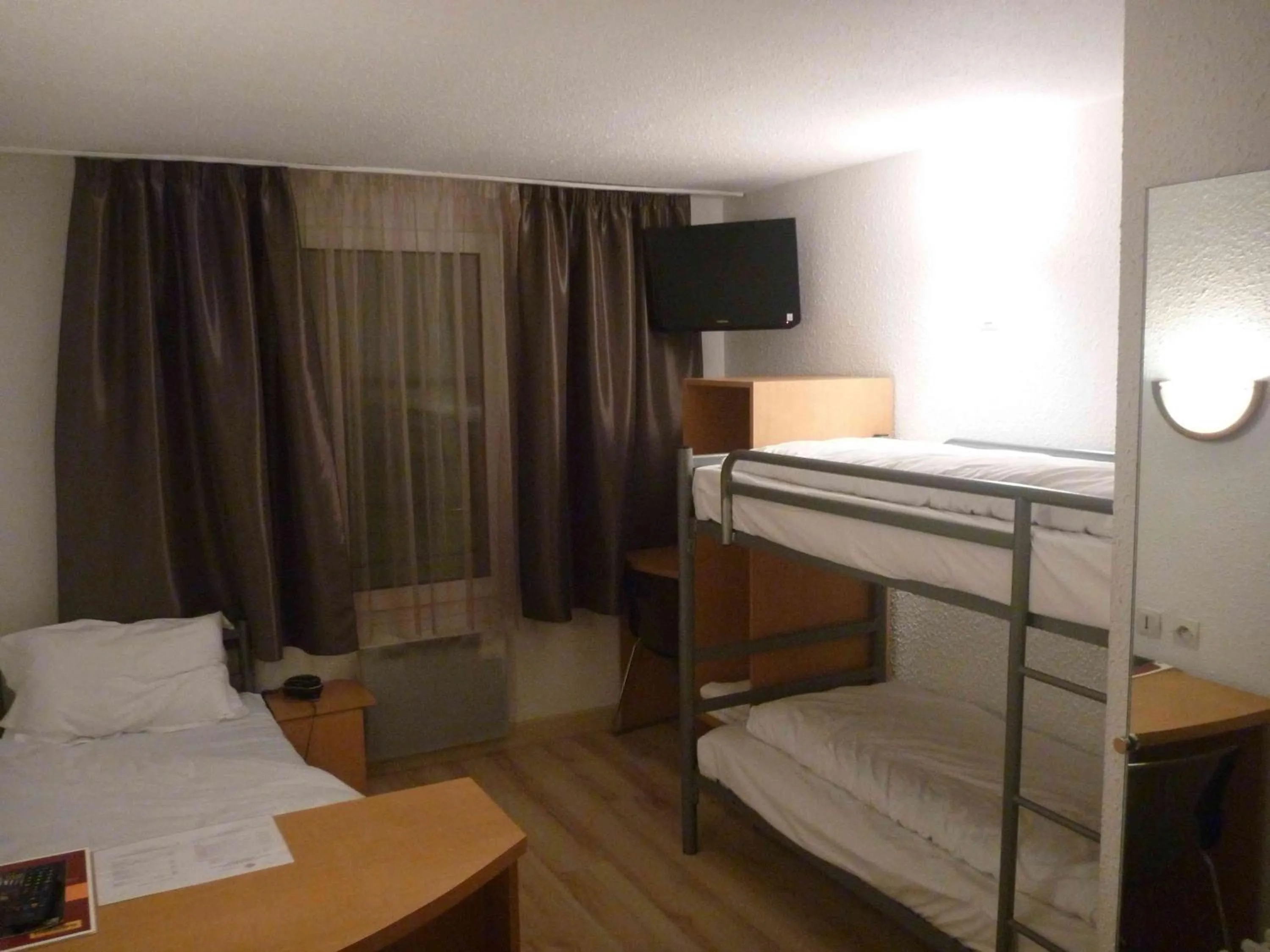 Photo of the whole room, Bed in Hotel Primo Colmar Centre