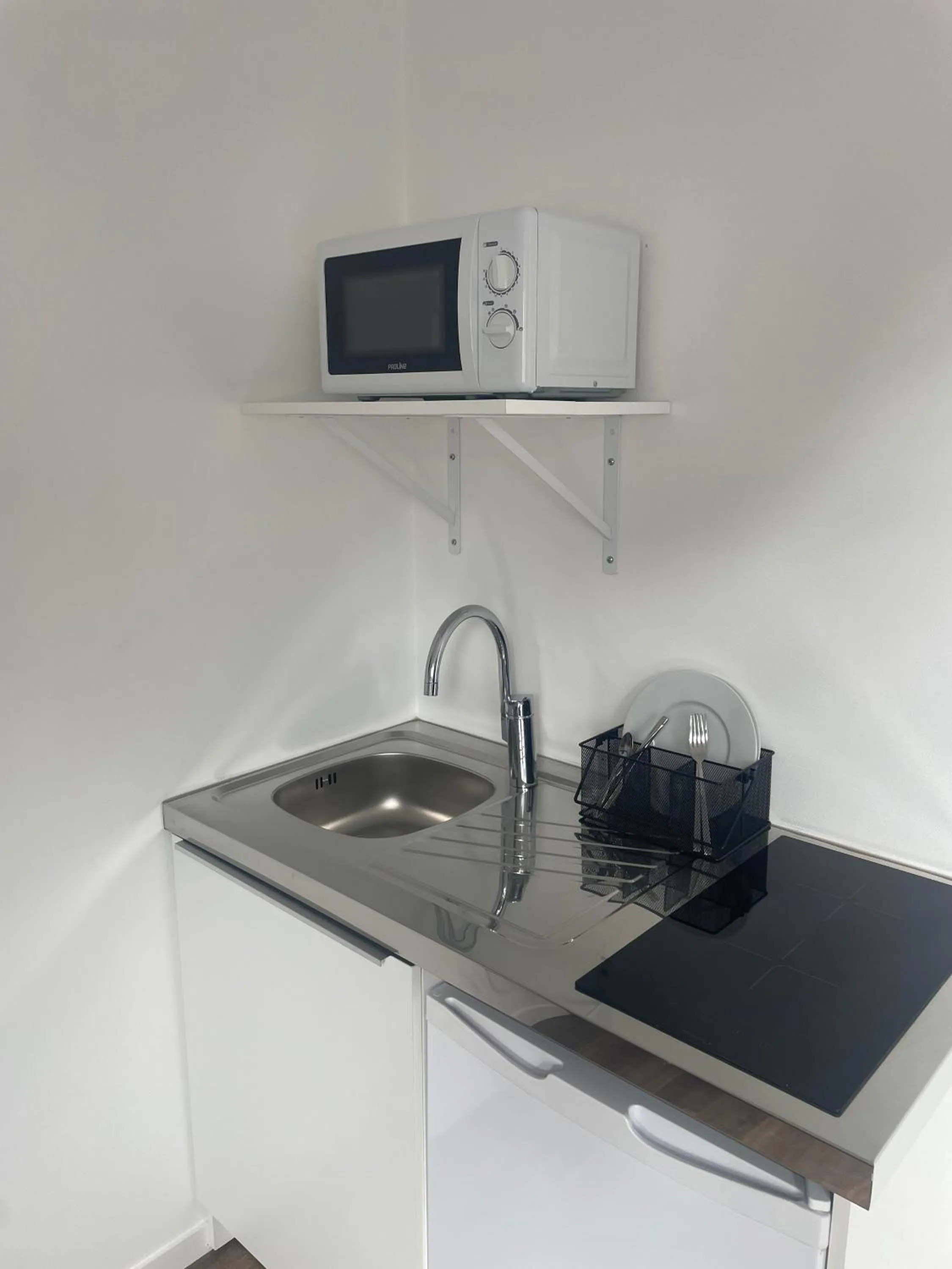 Kitchen or kitchenette in Hotel Le Paddock