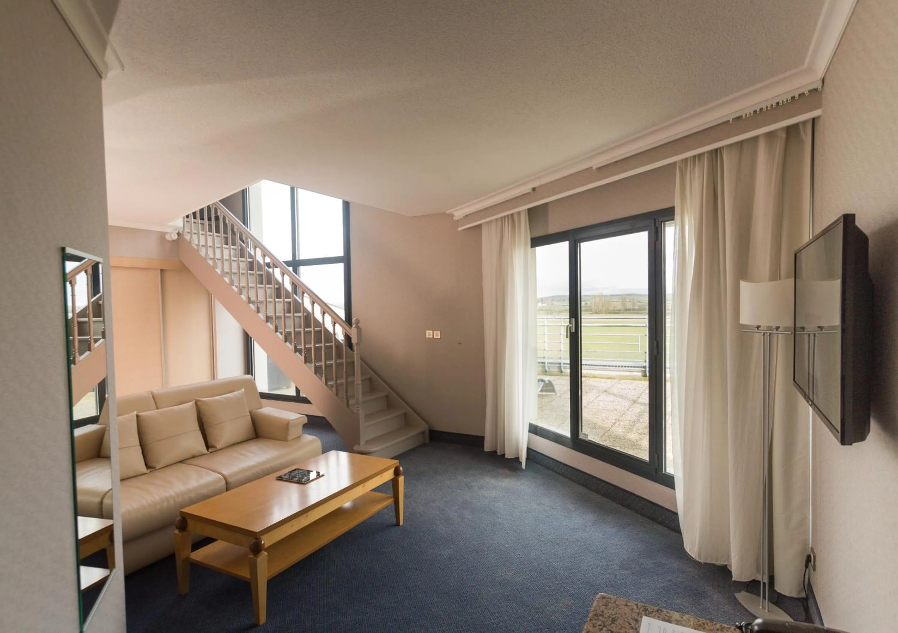 Living room in Hotel Le Paddock