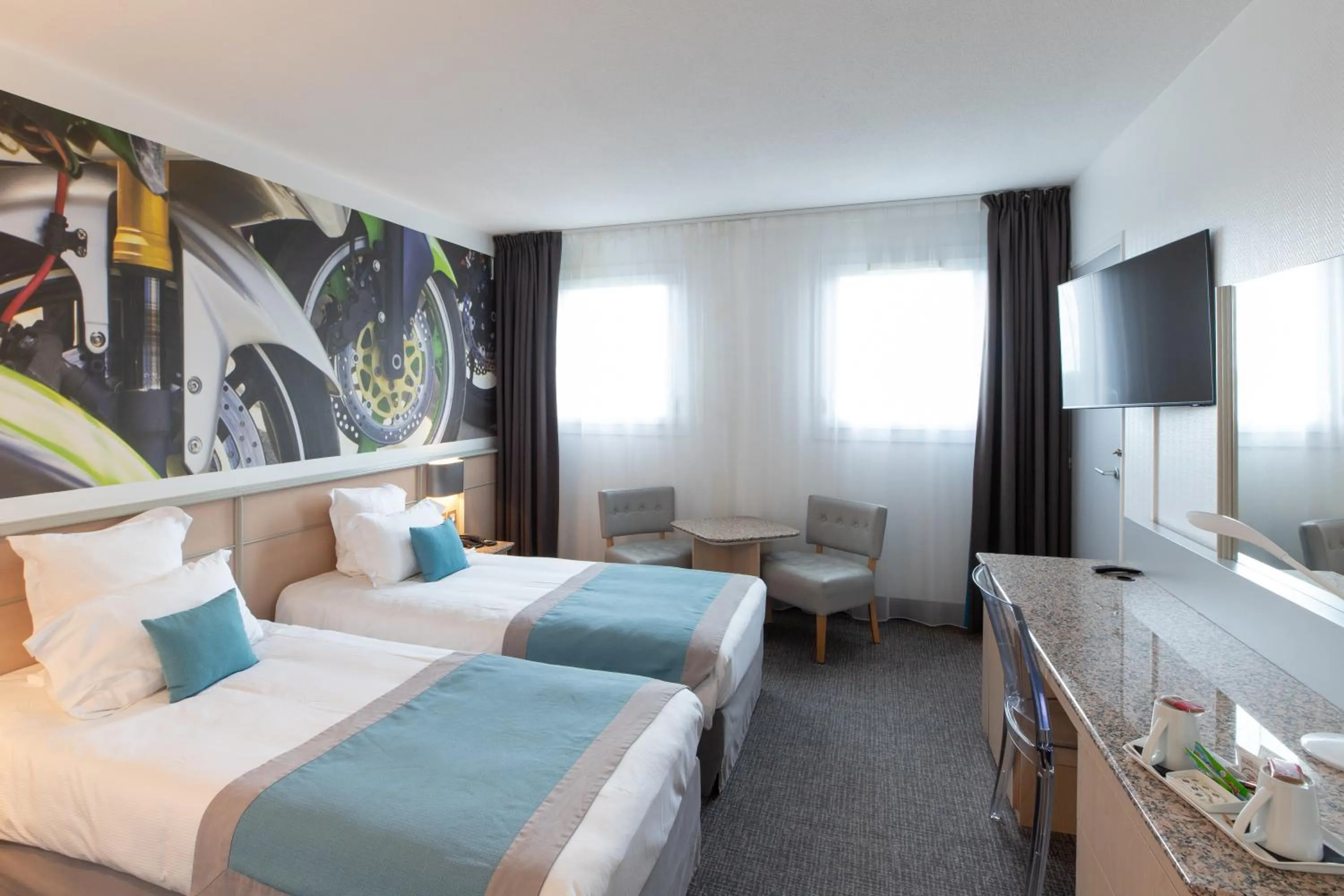 Bed in Hotel Le Paddock