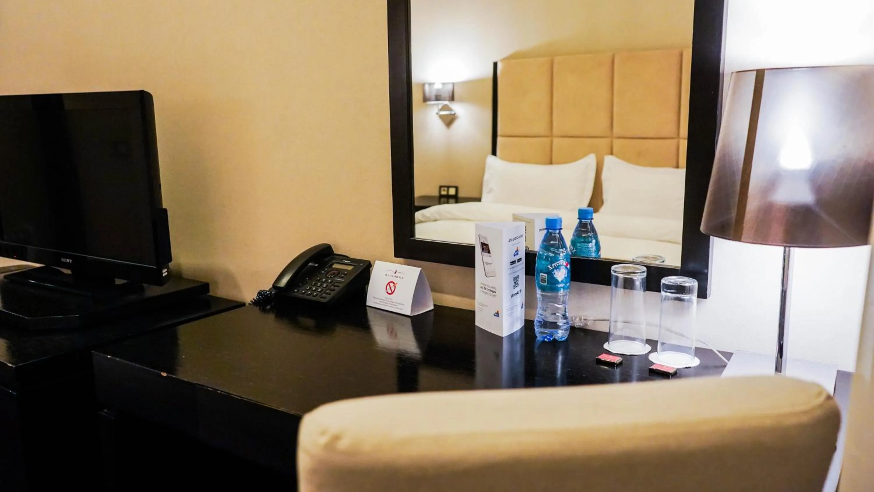 TV and multimedia, Bed in JELSOMINOHotel