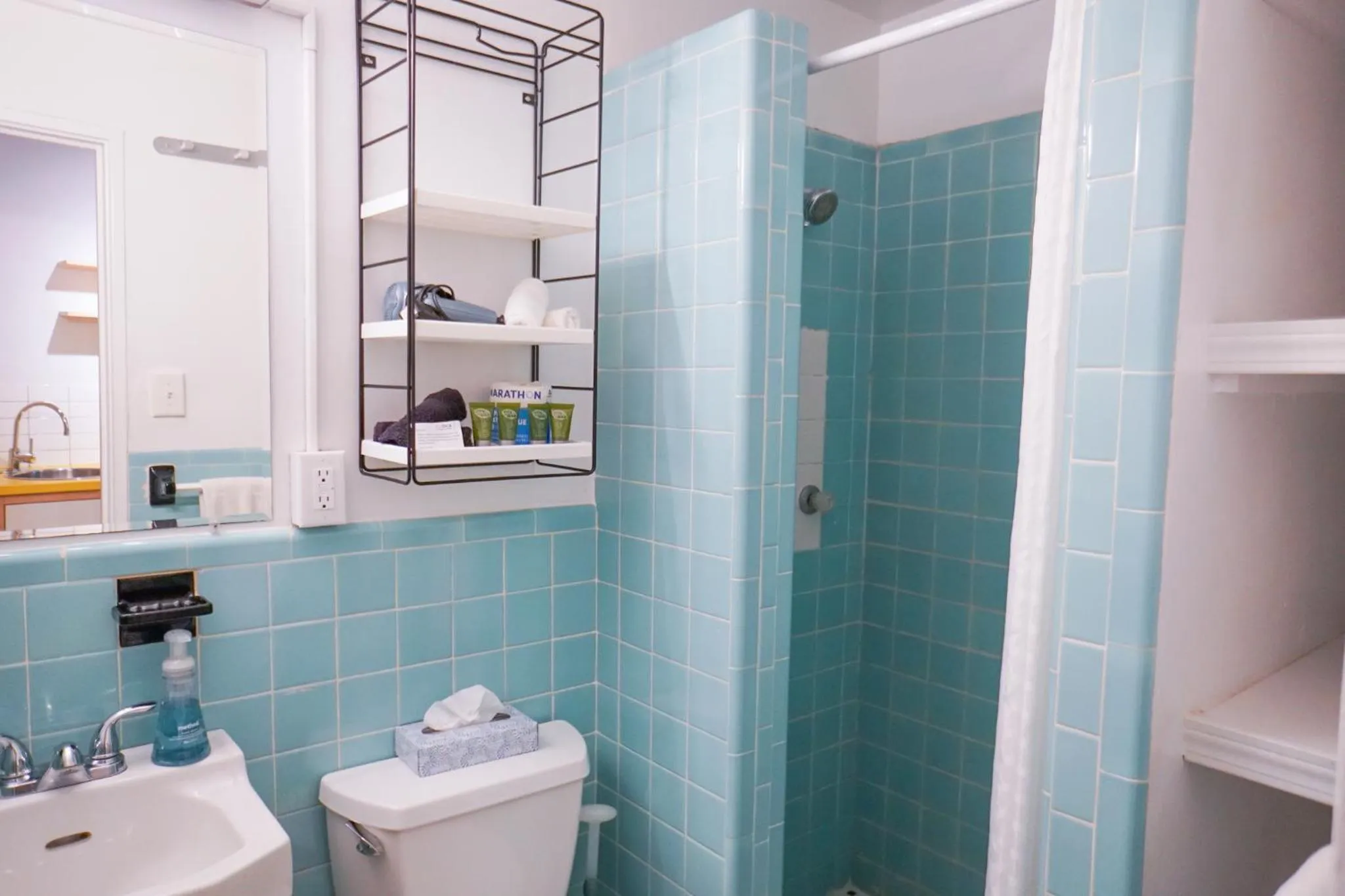 Shower in Studios On 25th by BCA Furnished Apartments