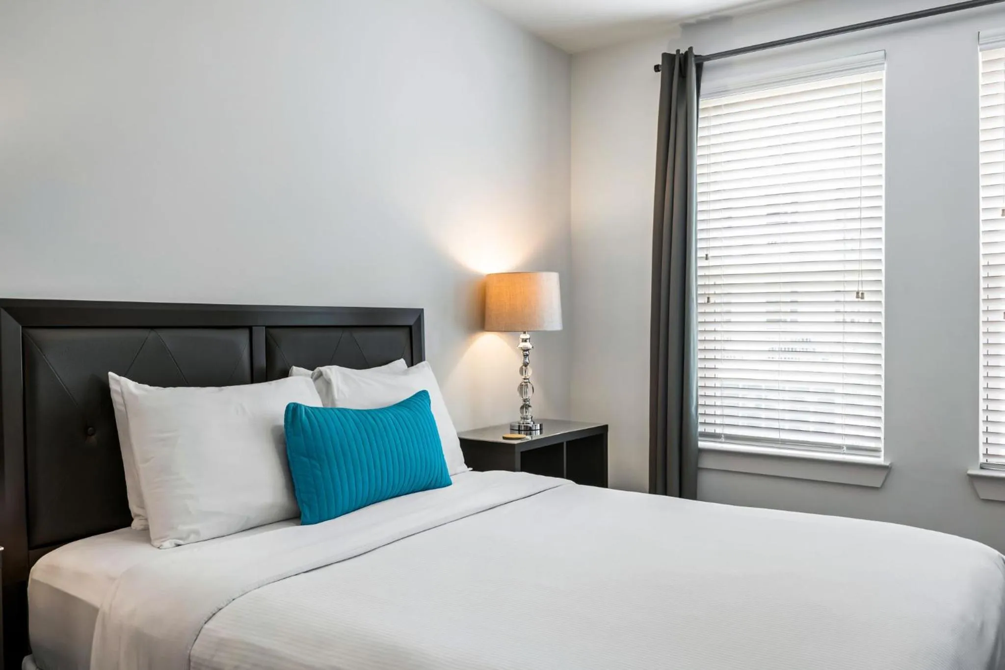 Bed in Spectacular Apartments by BCA Furnished Apartments