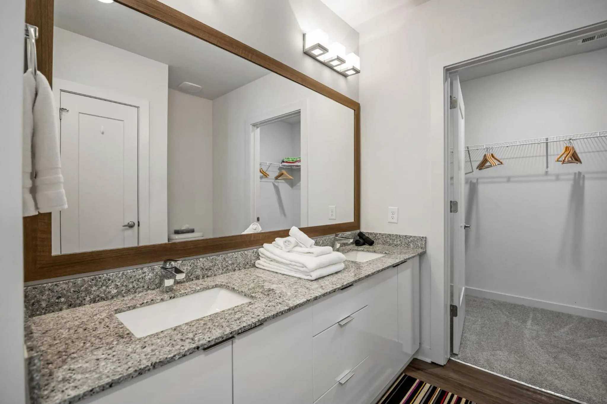Toilet in Spectacular Apartments by BCA Furnished Apartments