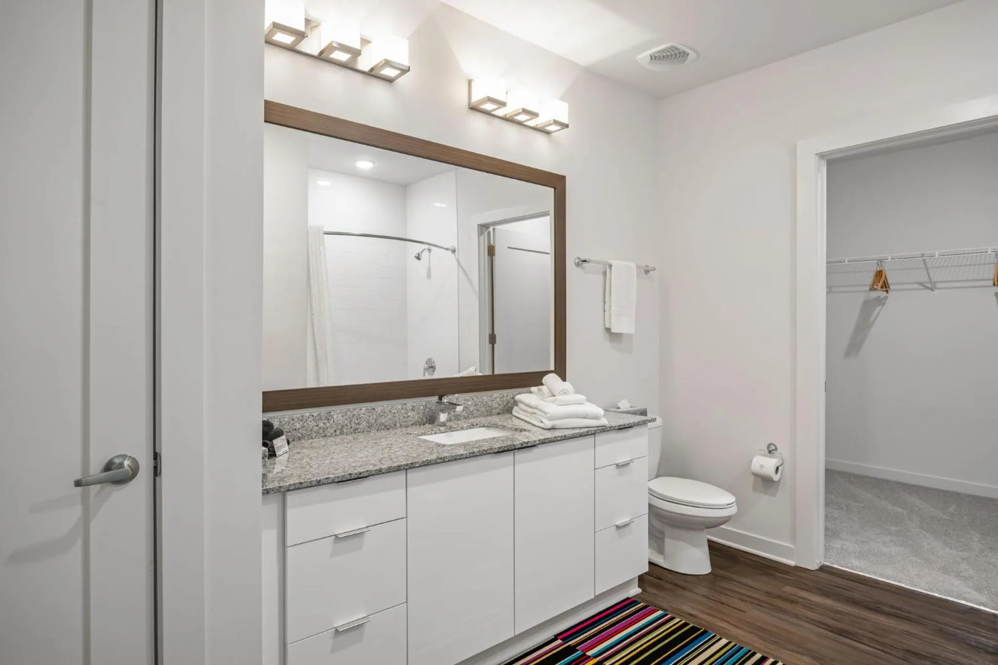 Toilet in Spectacular Apartments by BCA Furnished Apartments