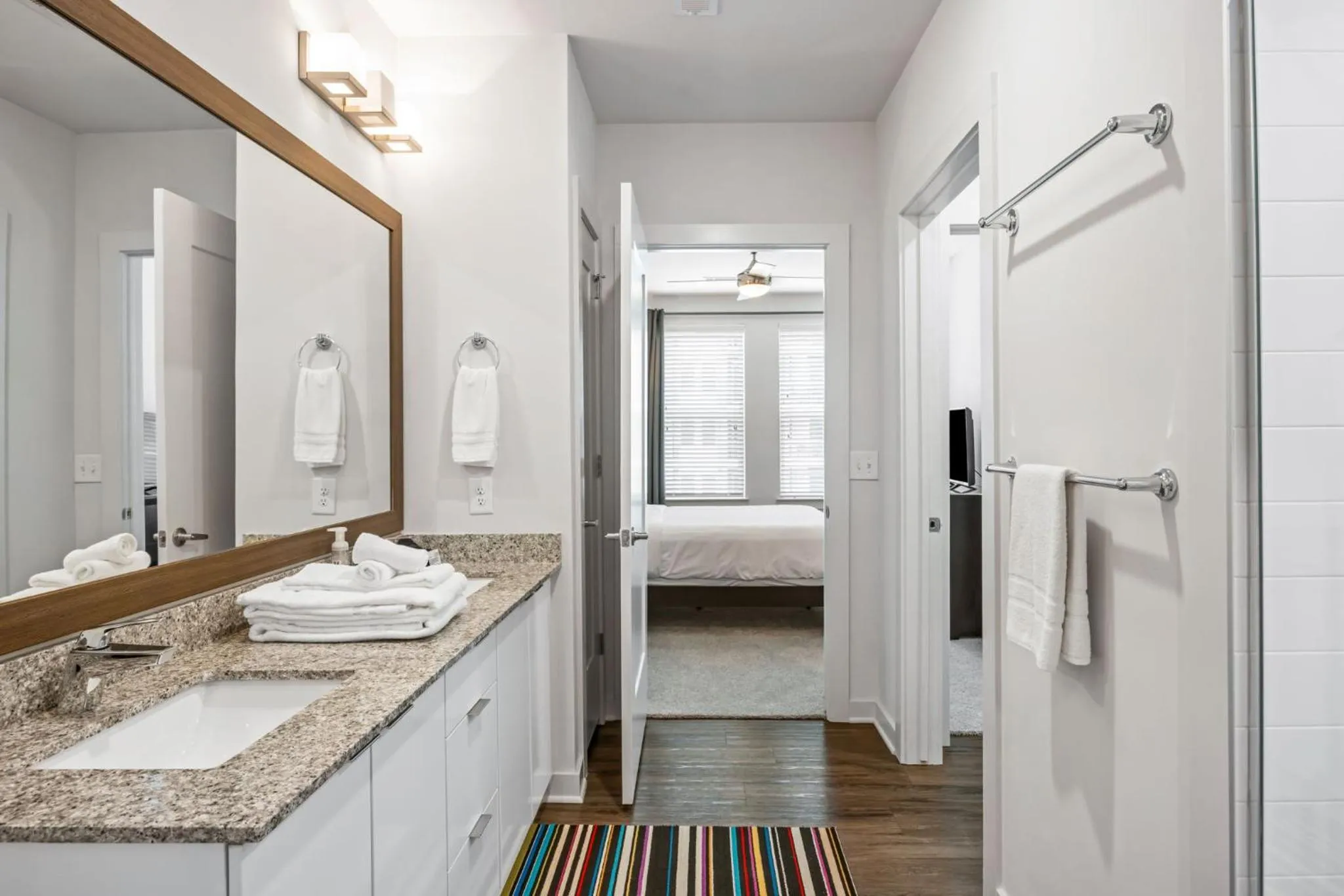 Shower, Bed in Spectacular Apartments by BCA Furnished Apartments