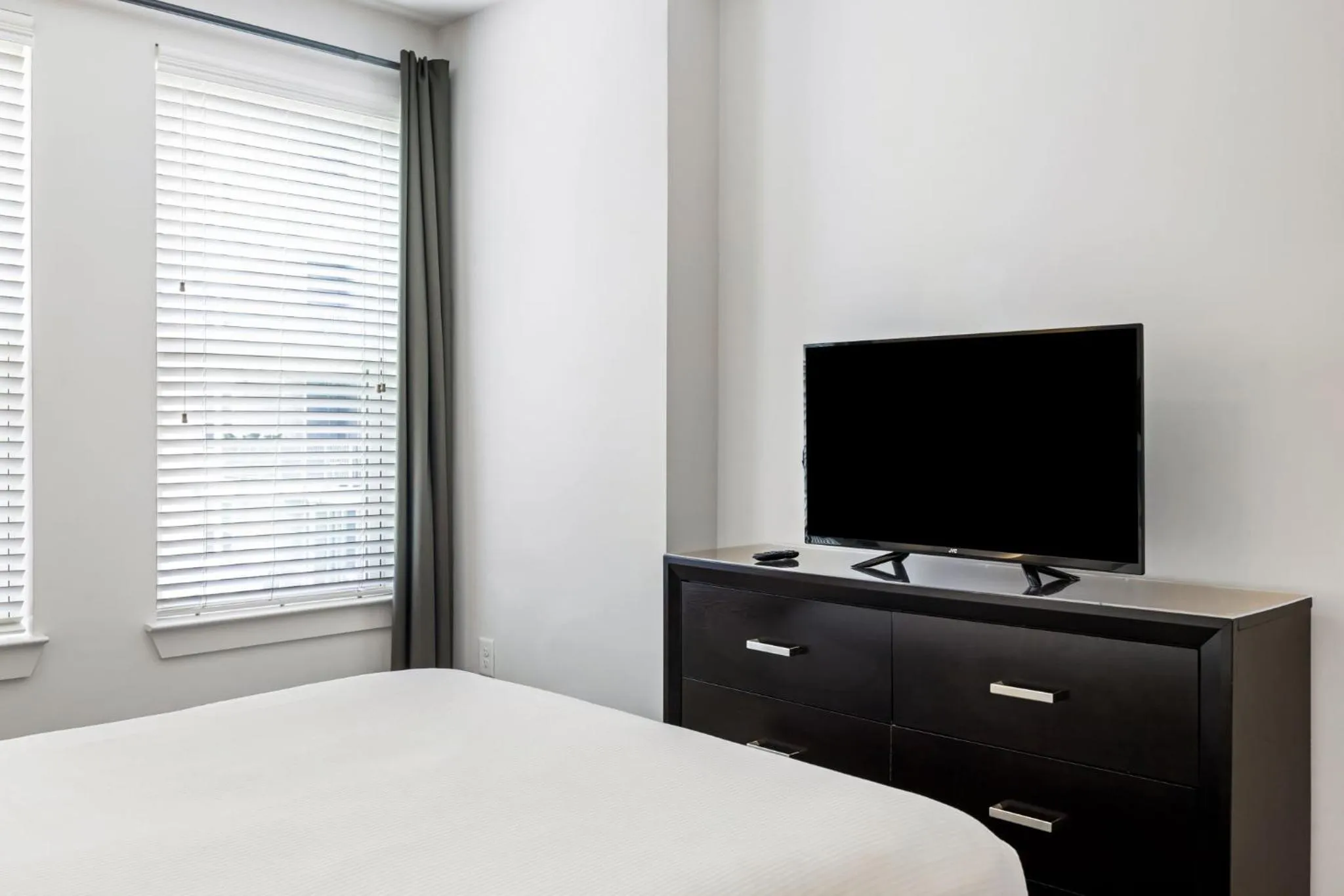 Bed in Spectacular Apartments by BCA Furnished Apartments