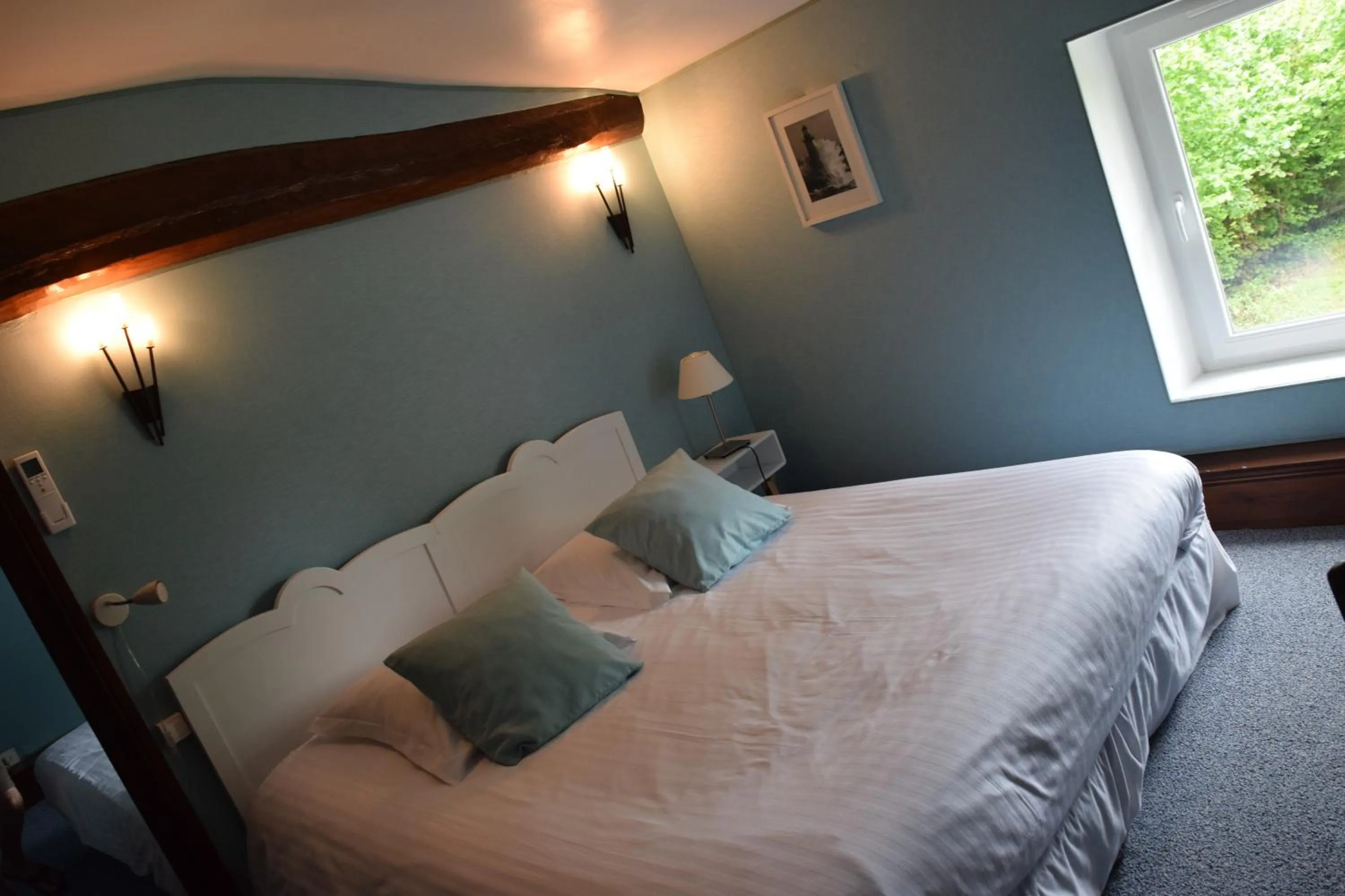 Bed in Logis Domaine du Prieuré