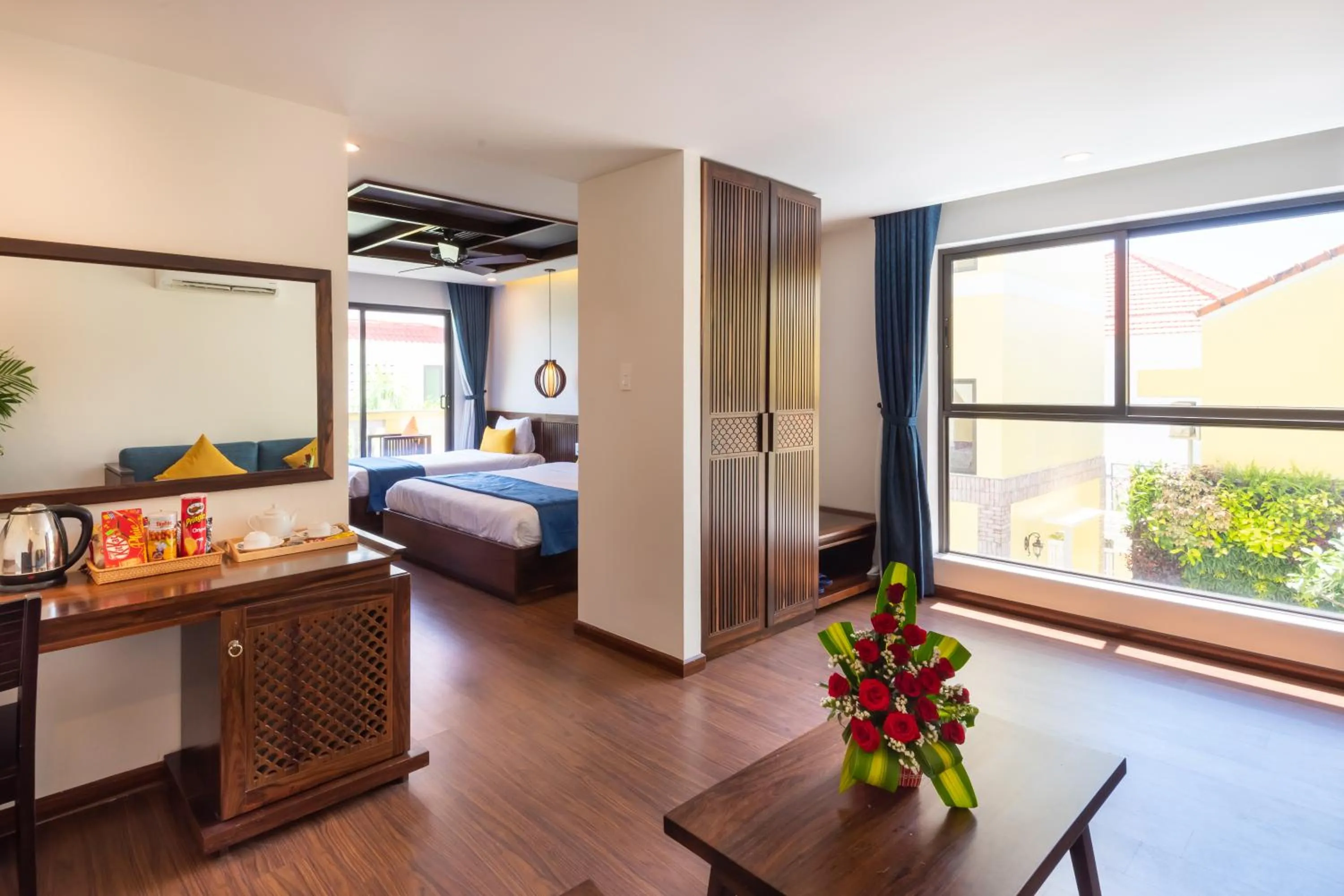 Living room, Bed in Eden Hoi An Villas